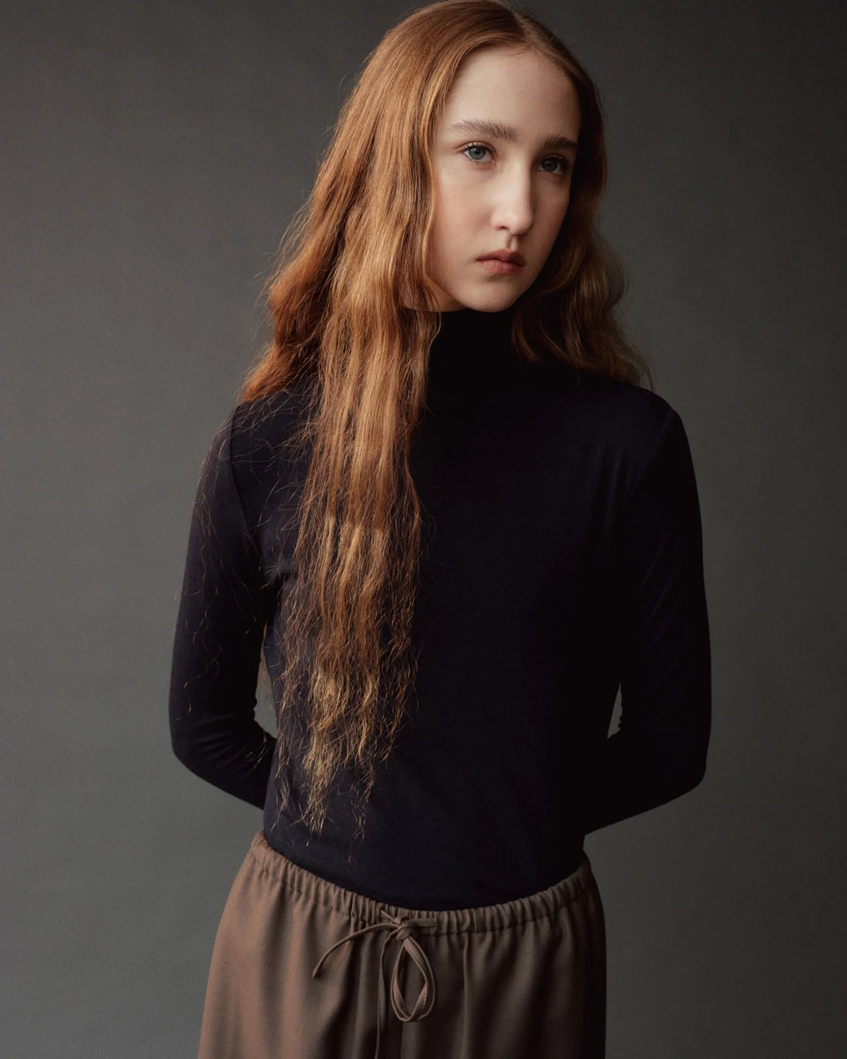 Mijeong Park dark navy slim fit jersey top with roll neck at Alas Eius