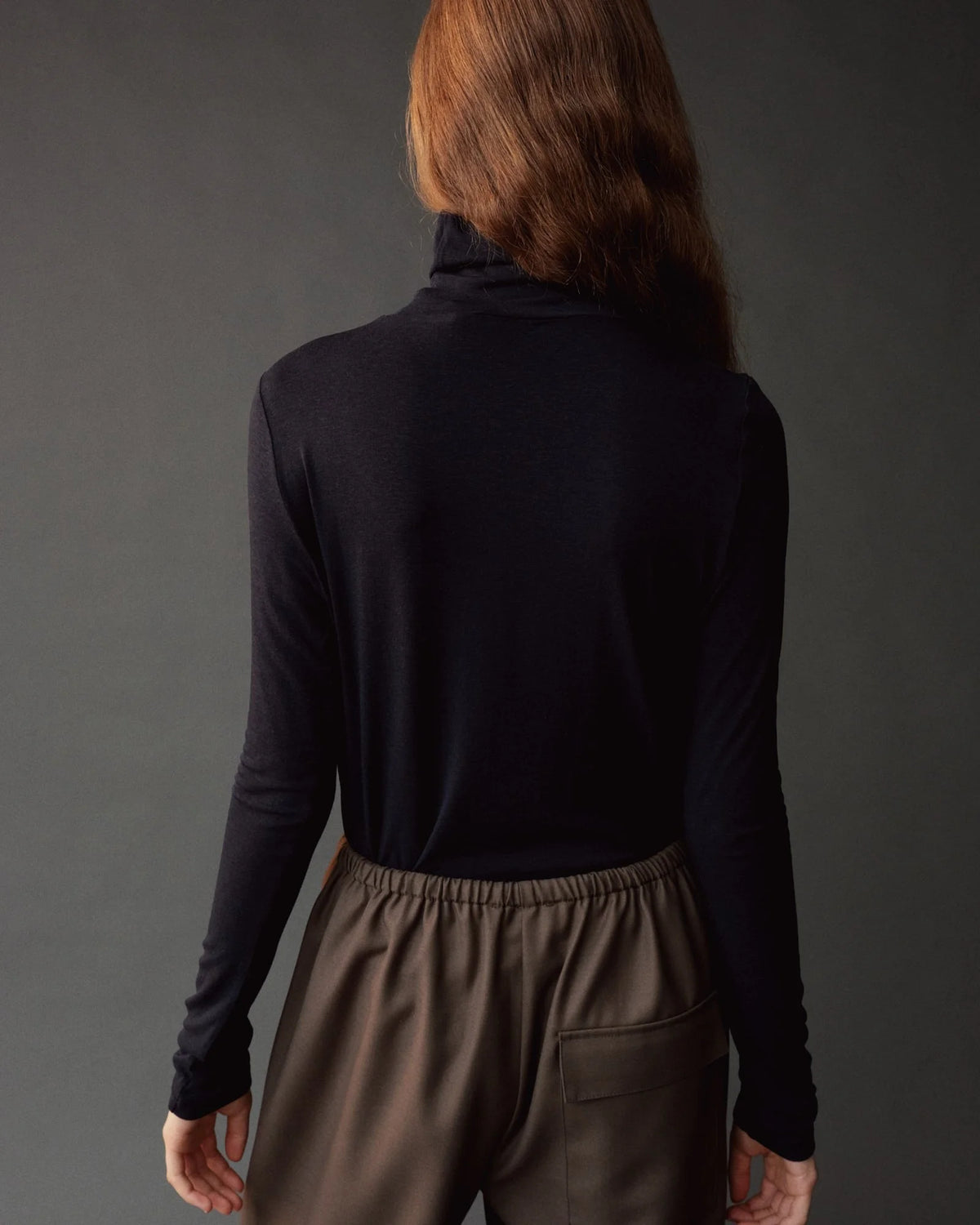 Mijeong Park dark navy lightweight stretch jersey top at Alas Eius