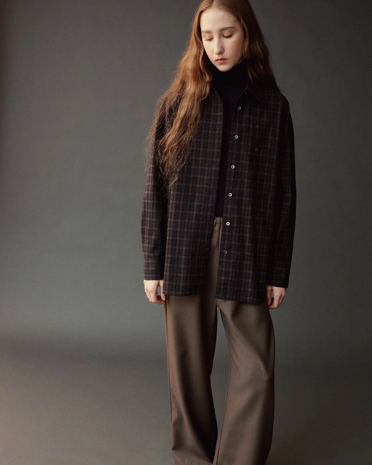 Mijeong Park dark navy long sleeve roll neck top at Alas Eius