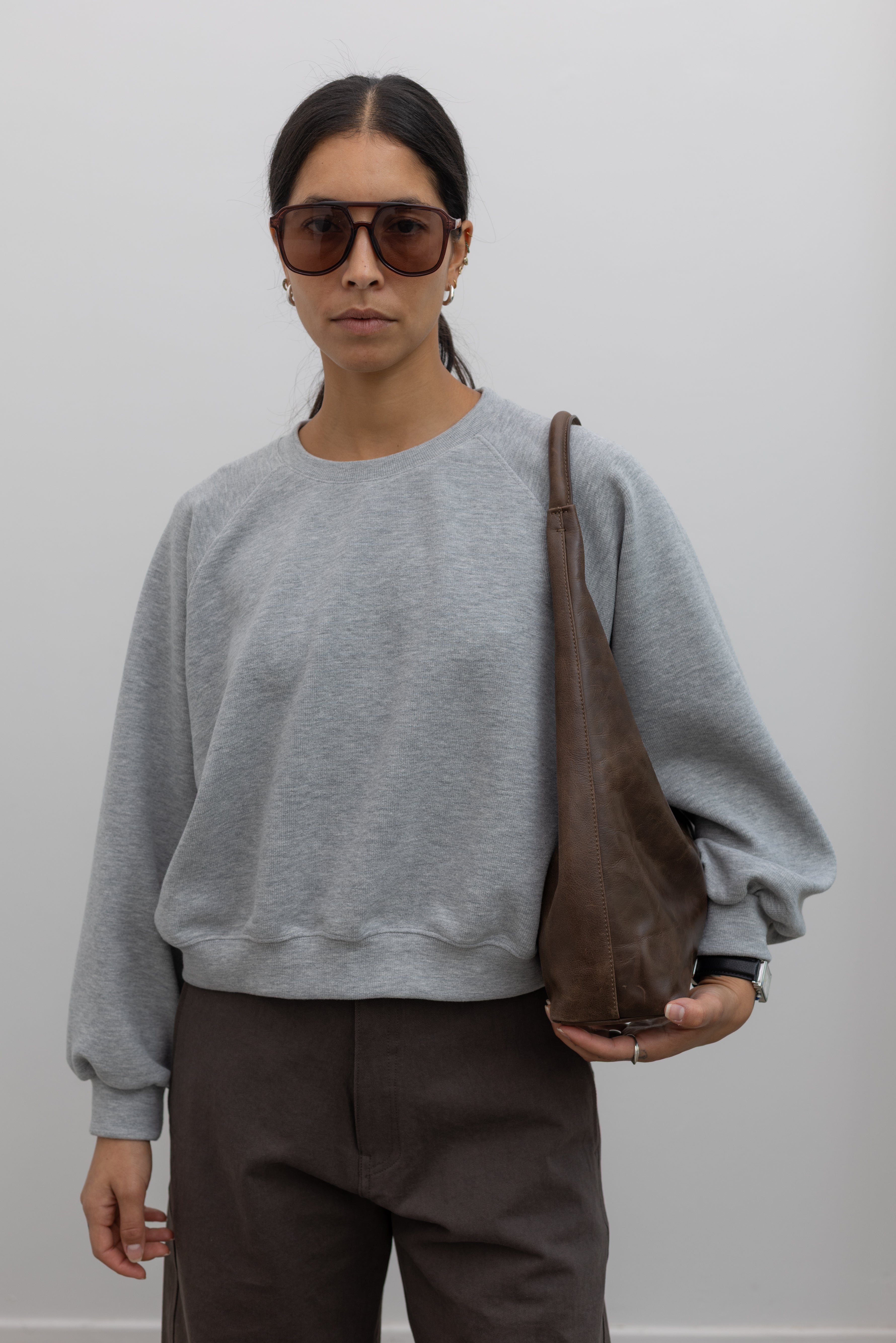 Heather gray raglan sleeve sweatshirt, detailed front view