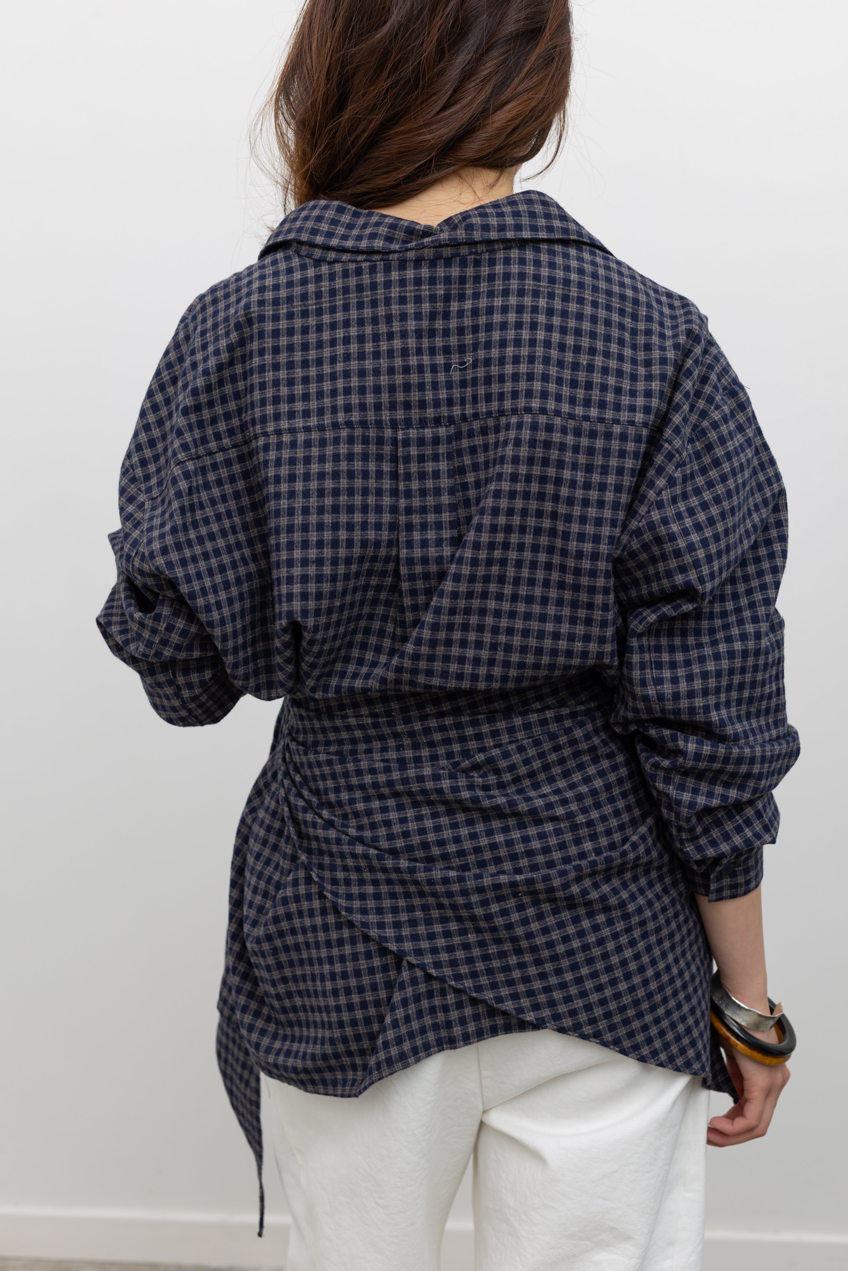 Alas Eius label relaxed fit navy blue and tan plaid button-down top styled with coordinating triangle scarf around waist for a flattering cinched look. 