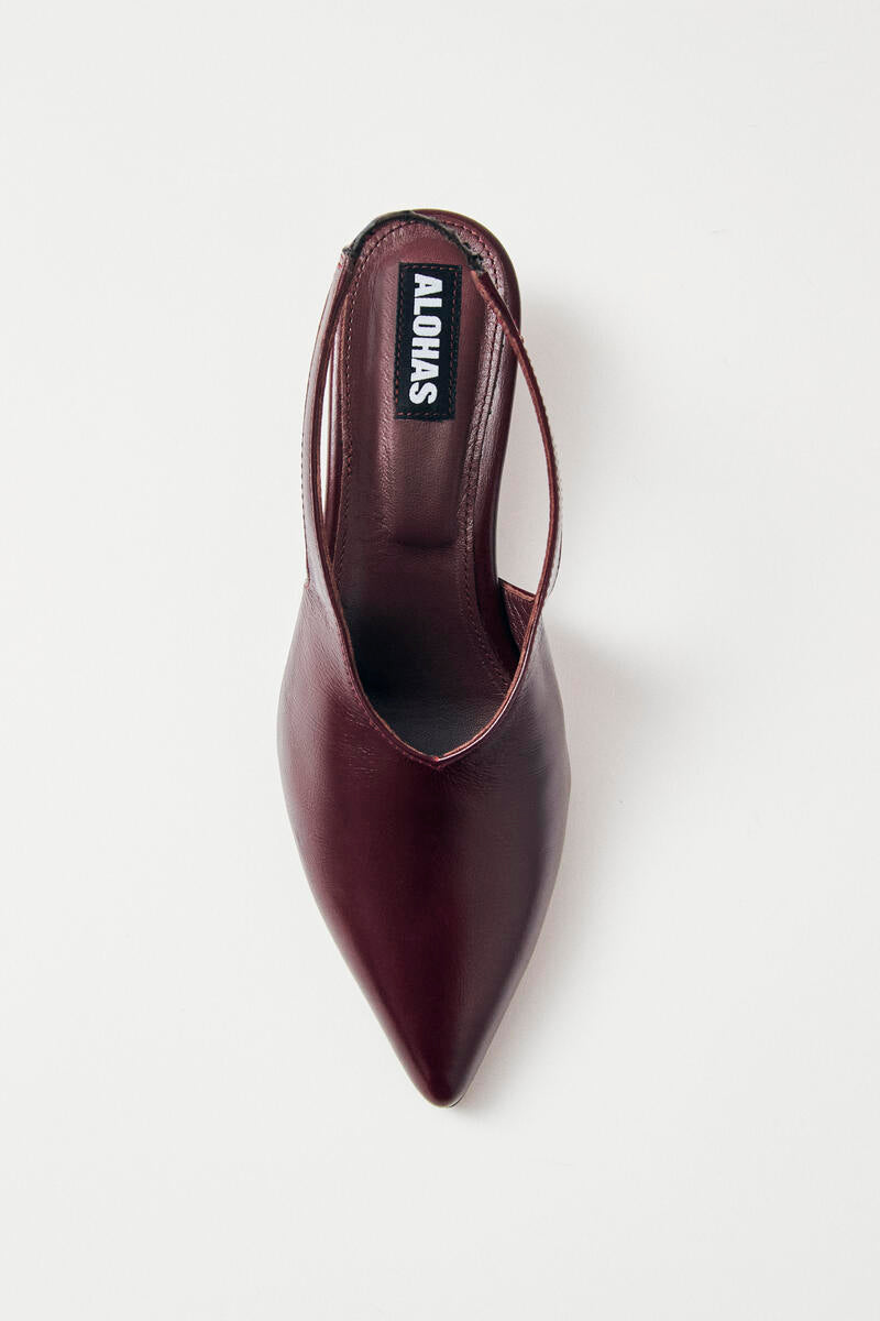 Alohas minimalist burgundy slingback heels featuring elasticated strap and elongated pointed vamp for refined elegance at Alas Eius
