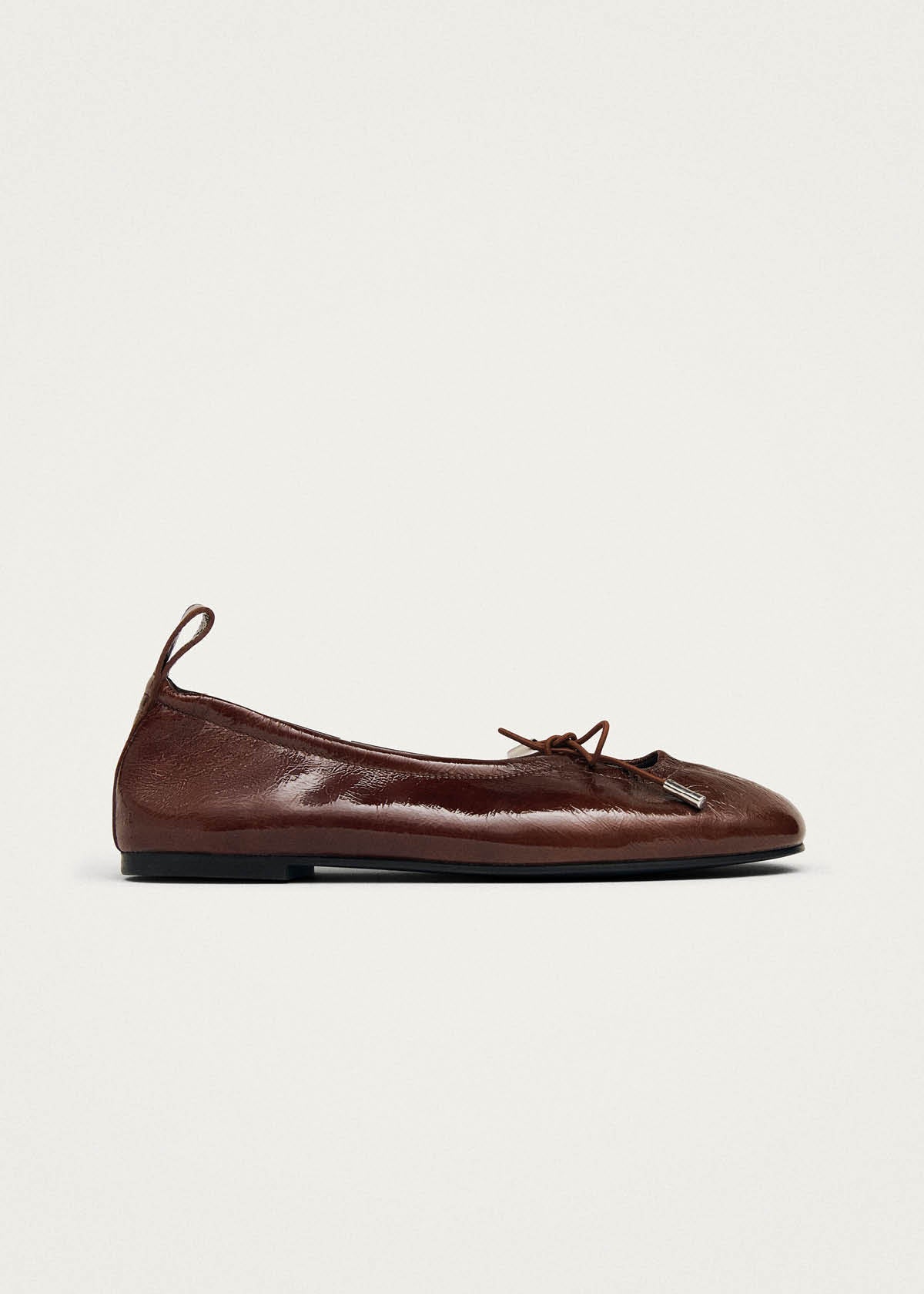 Alohas flexible brown patent leather ballet flats with drawstring unlined upper for lightweight everyday  comfort at Alas Eius