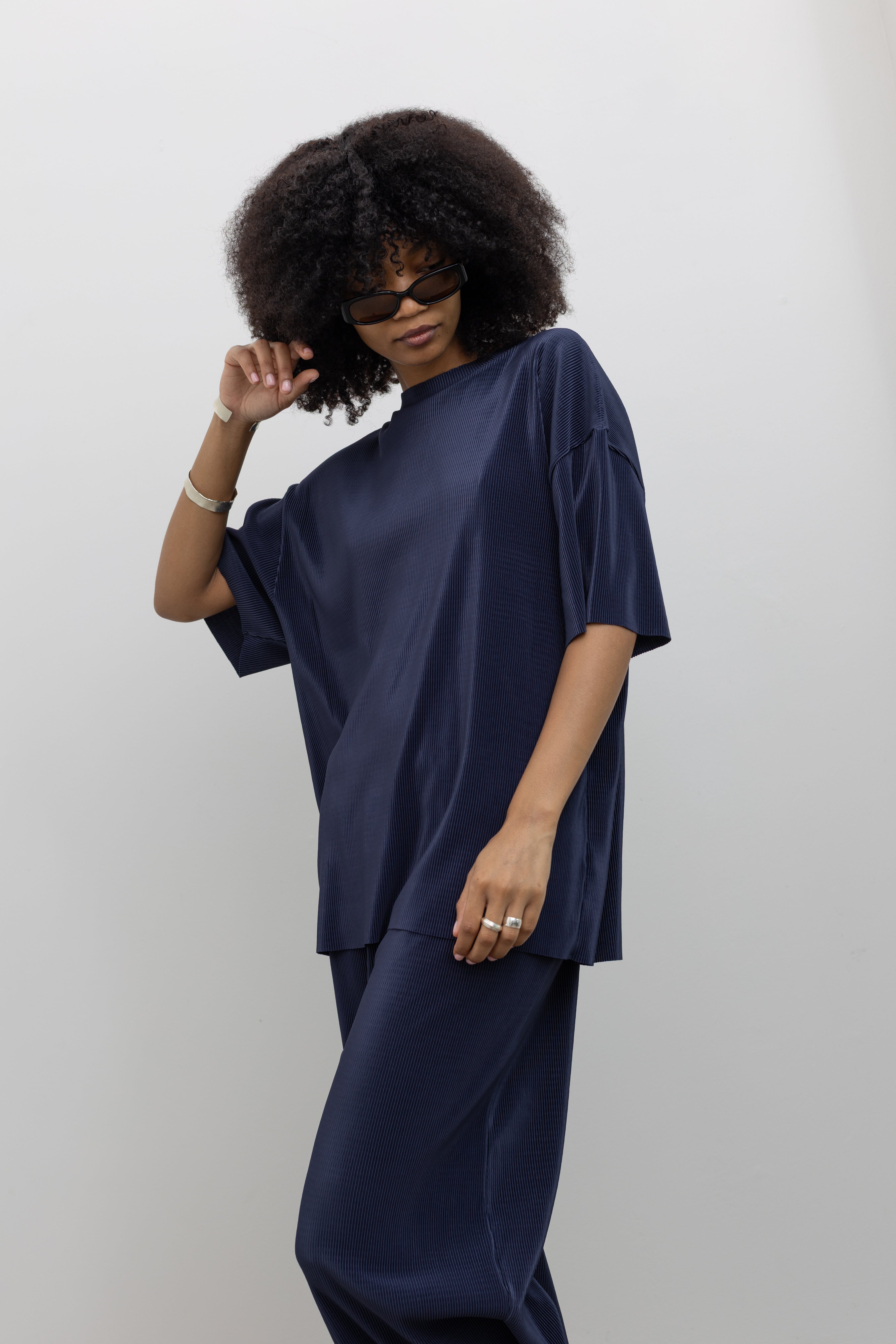 Collective dark navy micro-pleated oversized tee with dropped shoulders and relaxed fit at Alas Eius
