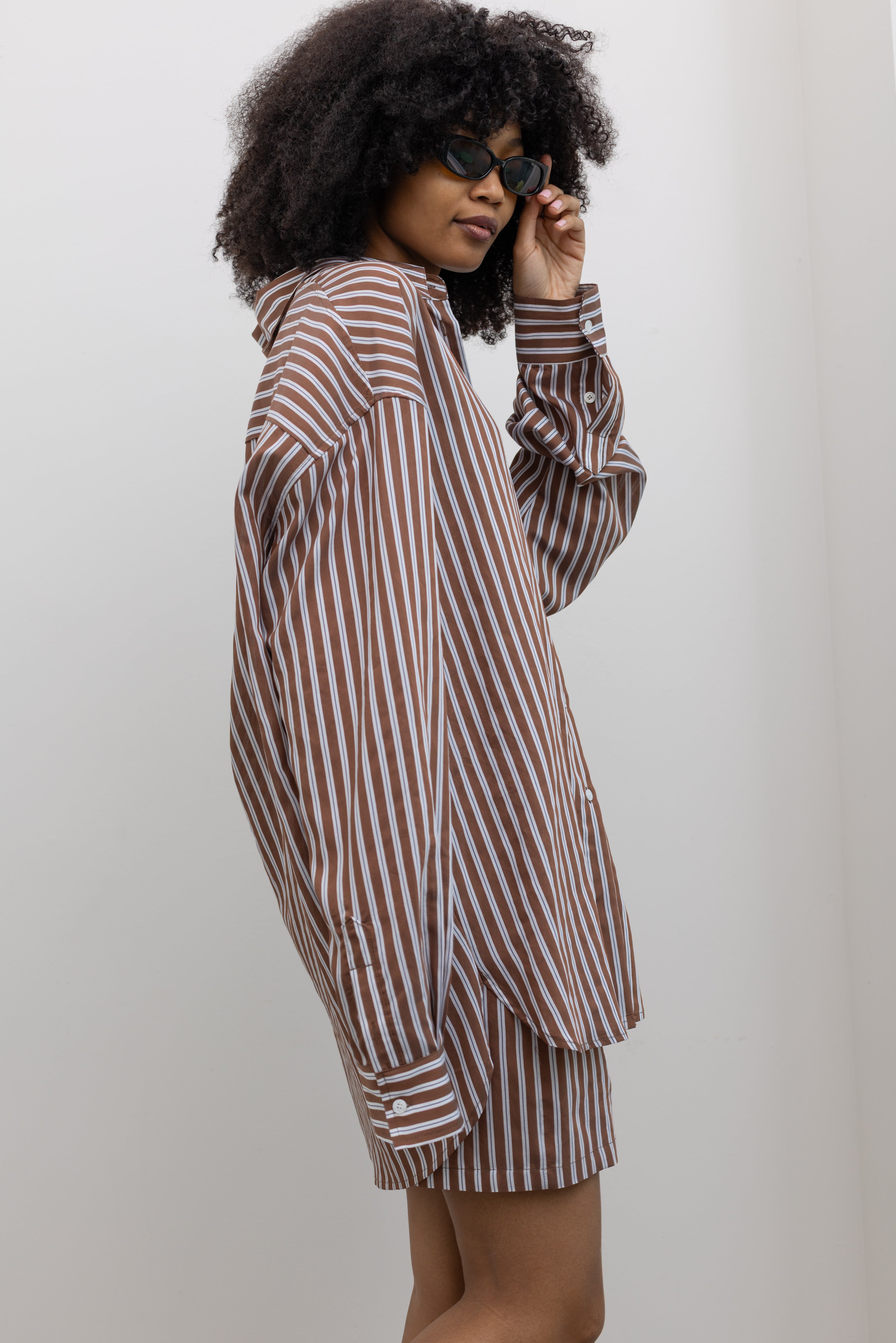 Collective oversized vertical pinstripe shirt with elongated back hem at Alas Eius