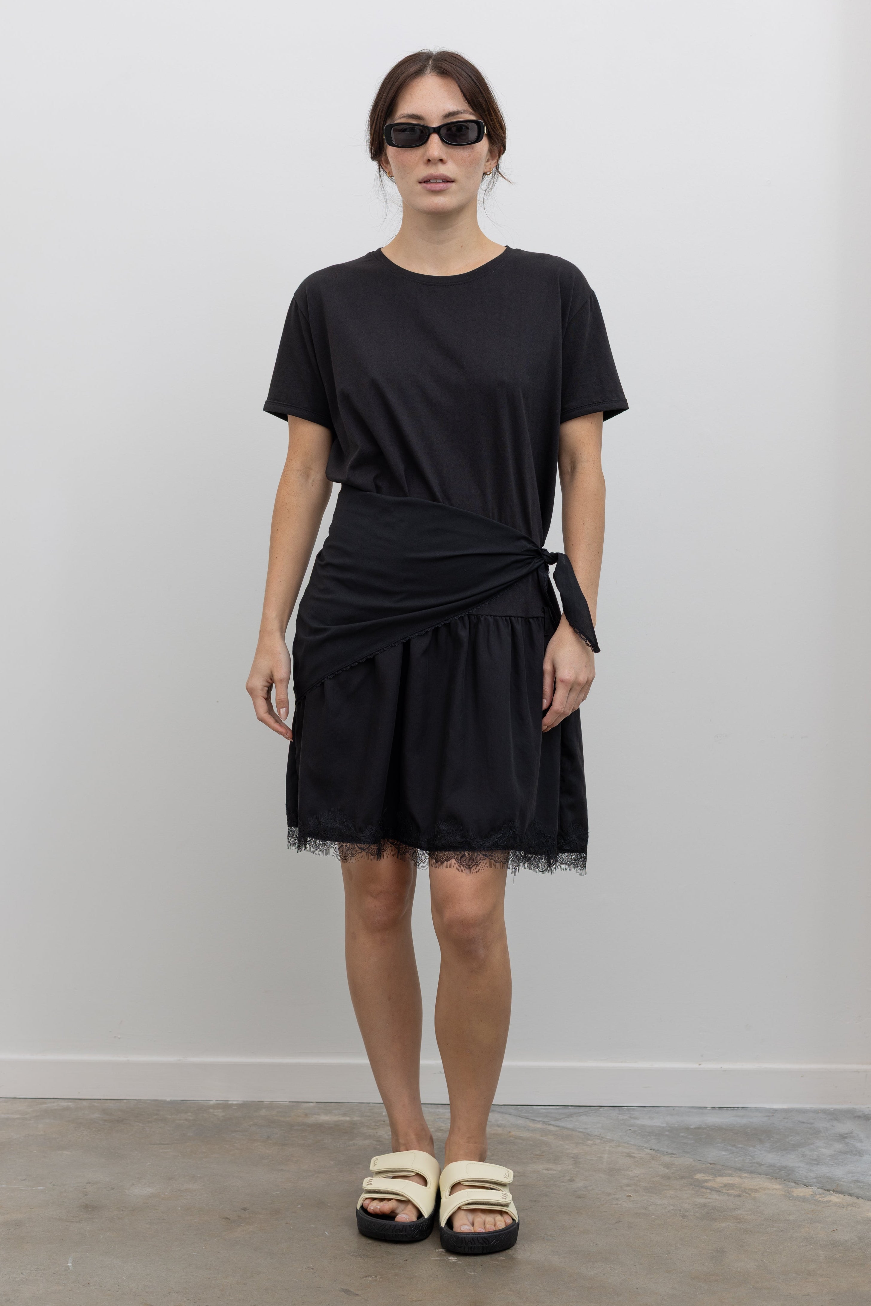 Collective relaxed black cotton mini dress with dropped waist and tie detail at Alas Eius