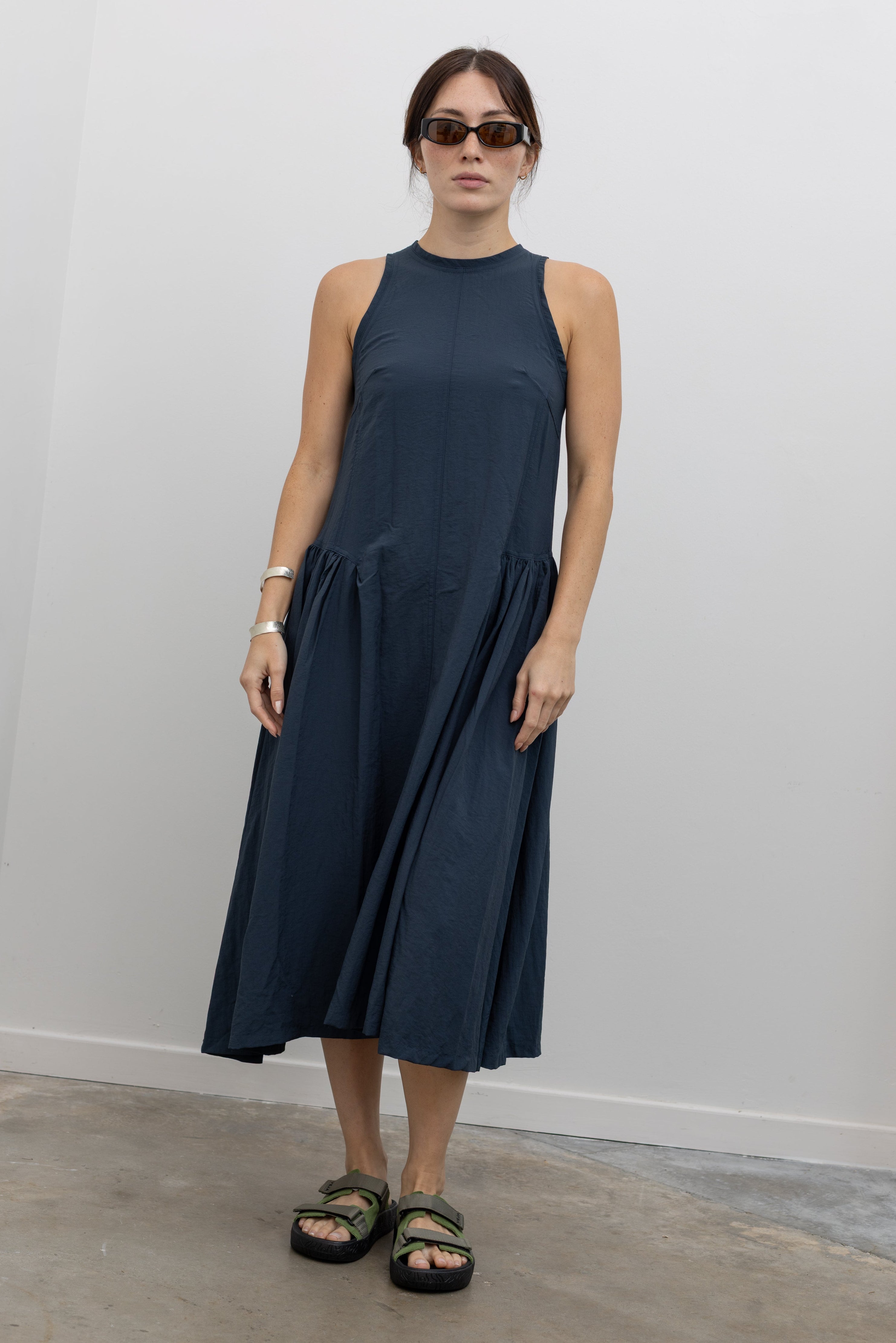 Collective sleeveless drop waist midi dress with gathered voluminous skirt at Alas Eius