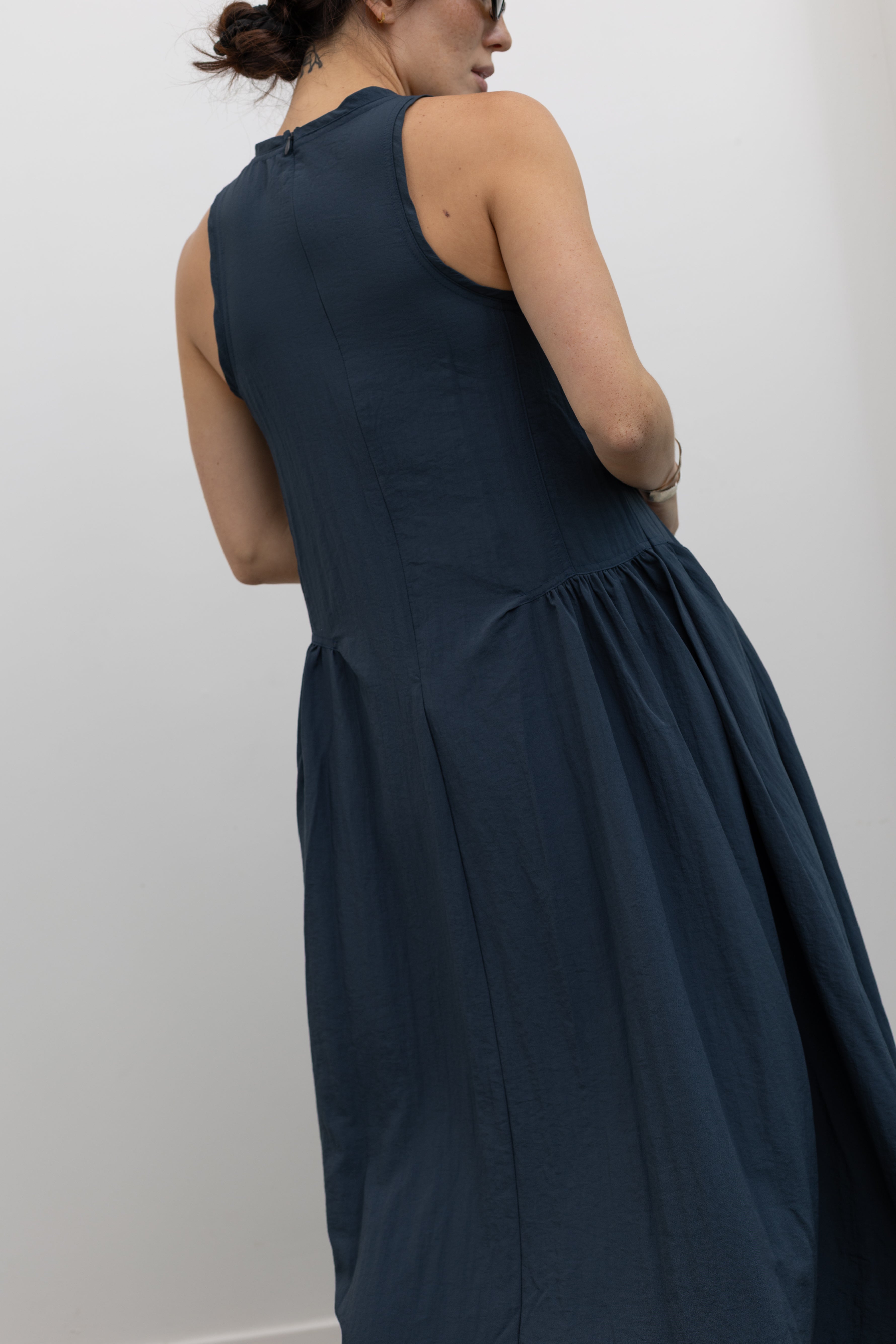 Collective voluminous drop waist cotton midi dress with modern silhouette at Alas Eius