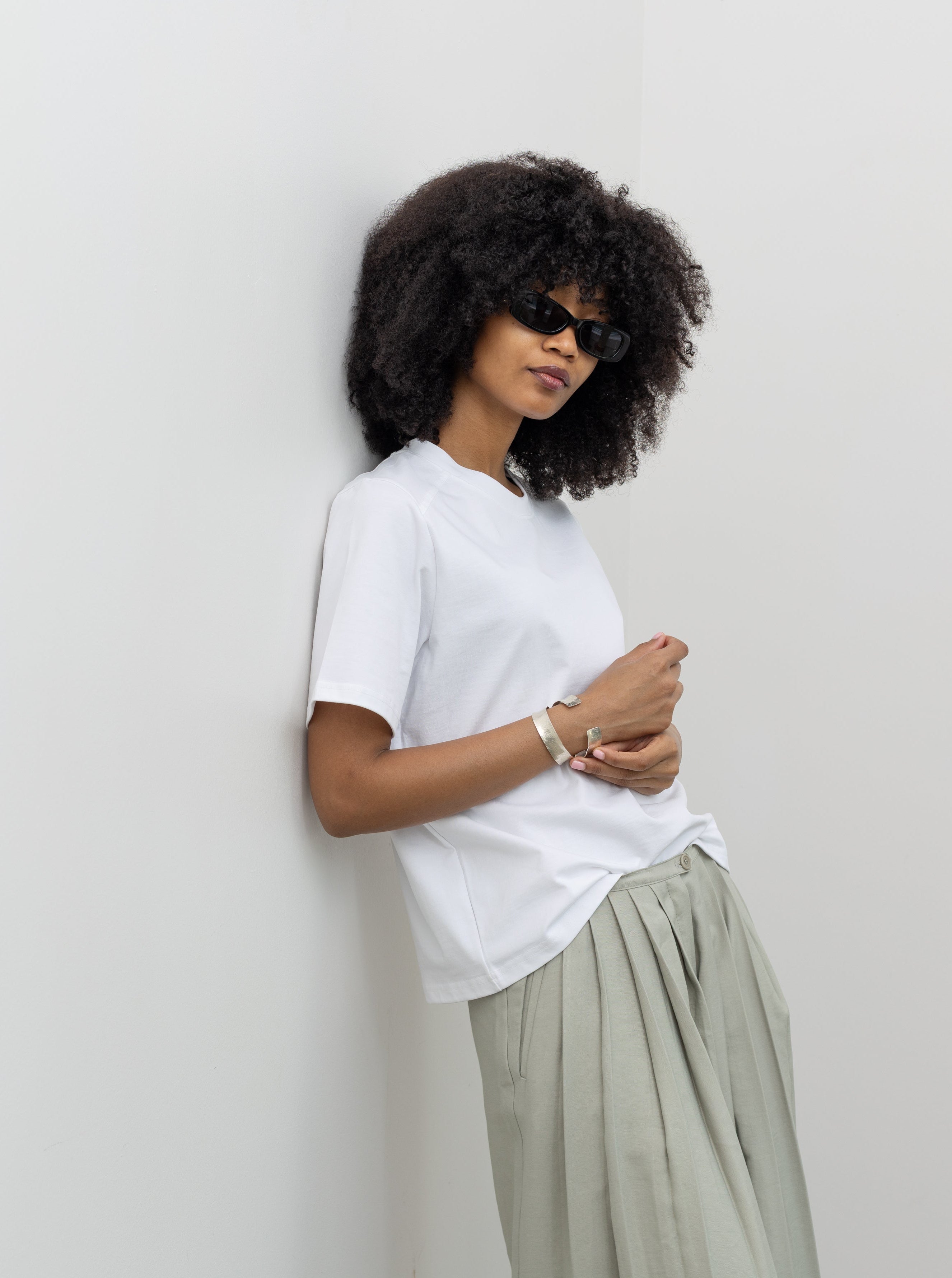 Collective white silk-touch cotton crew neck tee with smooth structured drape at Alas Eius