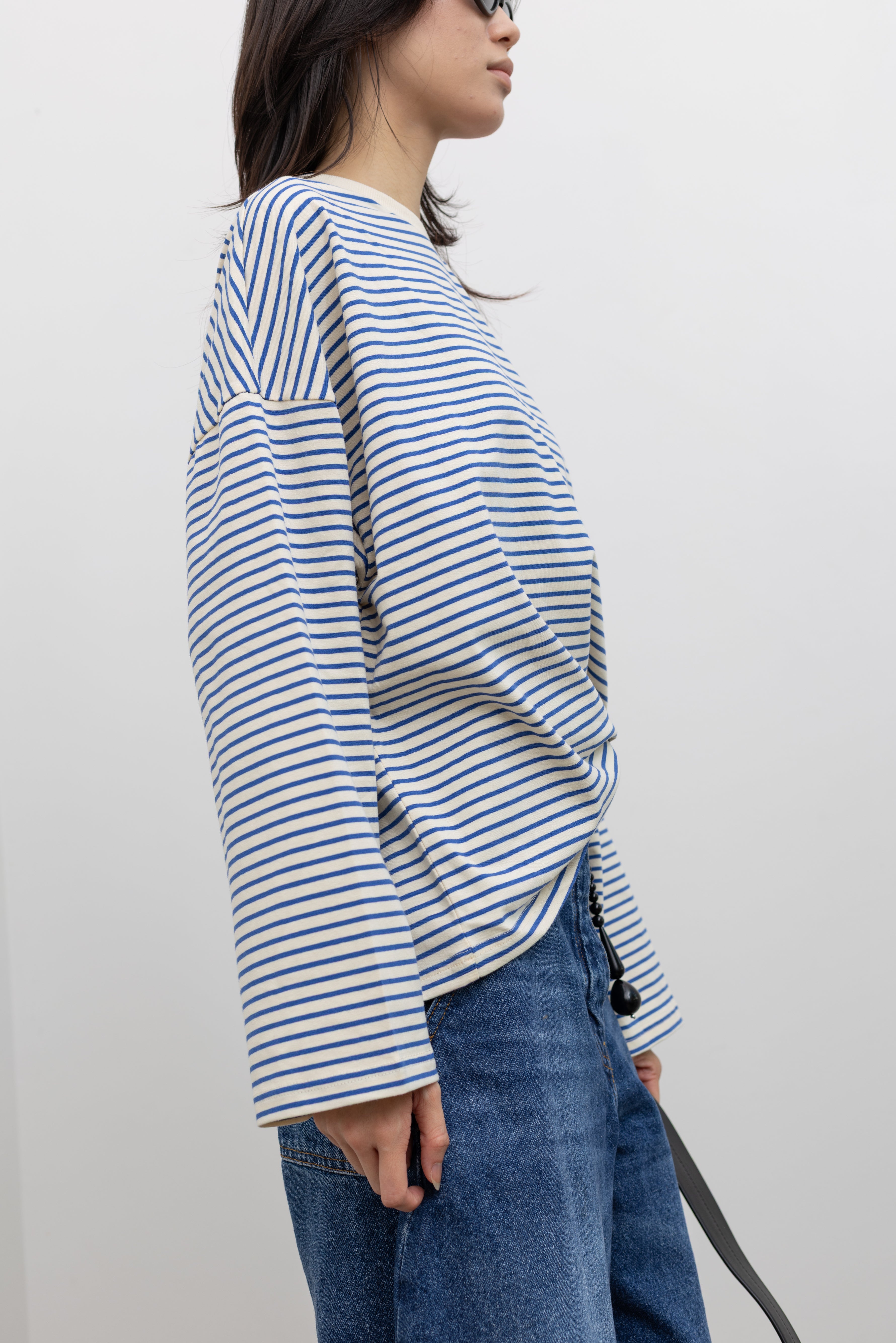Modern boxy striped cotton top by Collective with a crew neckline, drop shoulders, and wide sleeves, offering an easy, street-style inspired silhouette at Alas Eius.