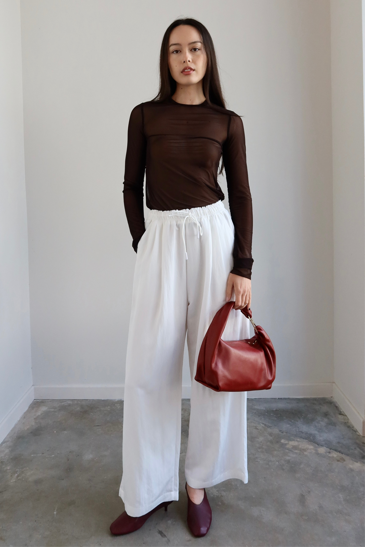 Collective relaxed wide-leg pants in a lightweight cotton blend at Alas Eius