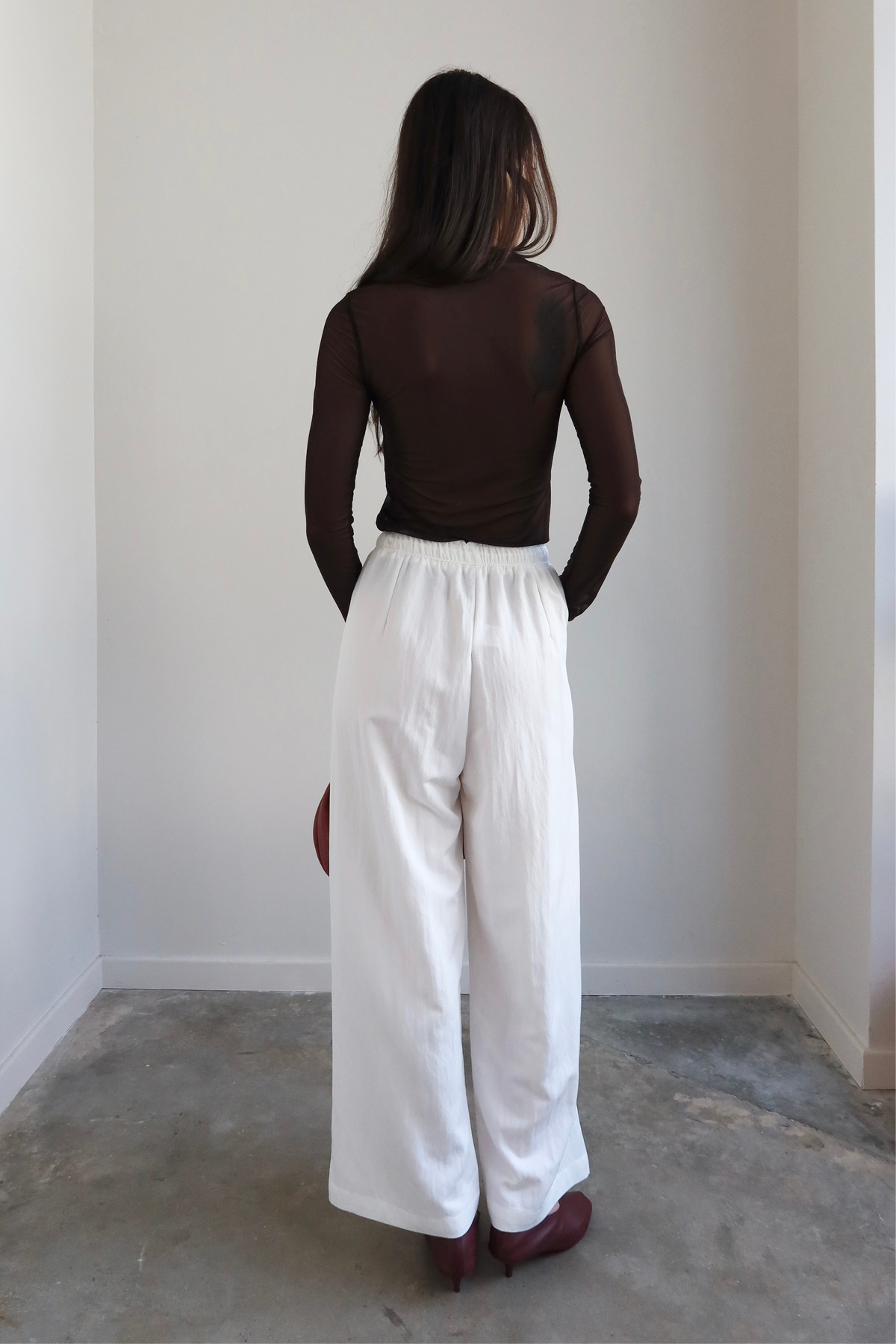 Collective casual wide-leg pants with relaxed fit and elastic waistband at Alas Eius