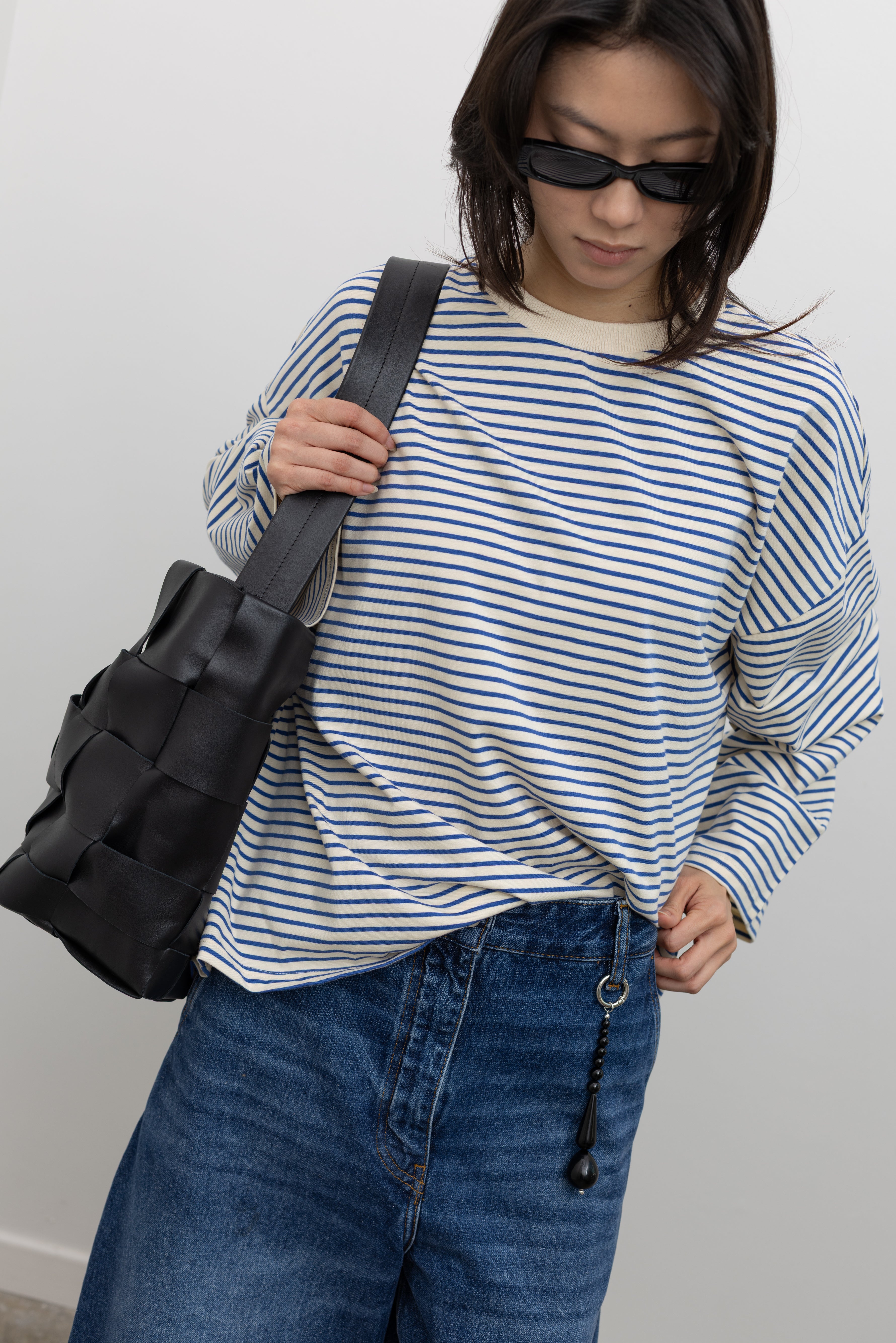 Relaxed fit striped knit top by Collective with an oversized boxy shape, crew neckline, drop shoulders, and soft cotton texture designed for easy layering at Alas Eius.
