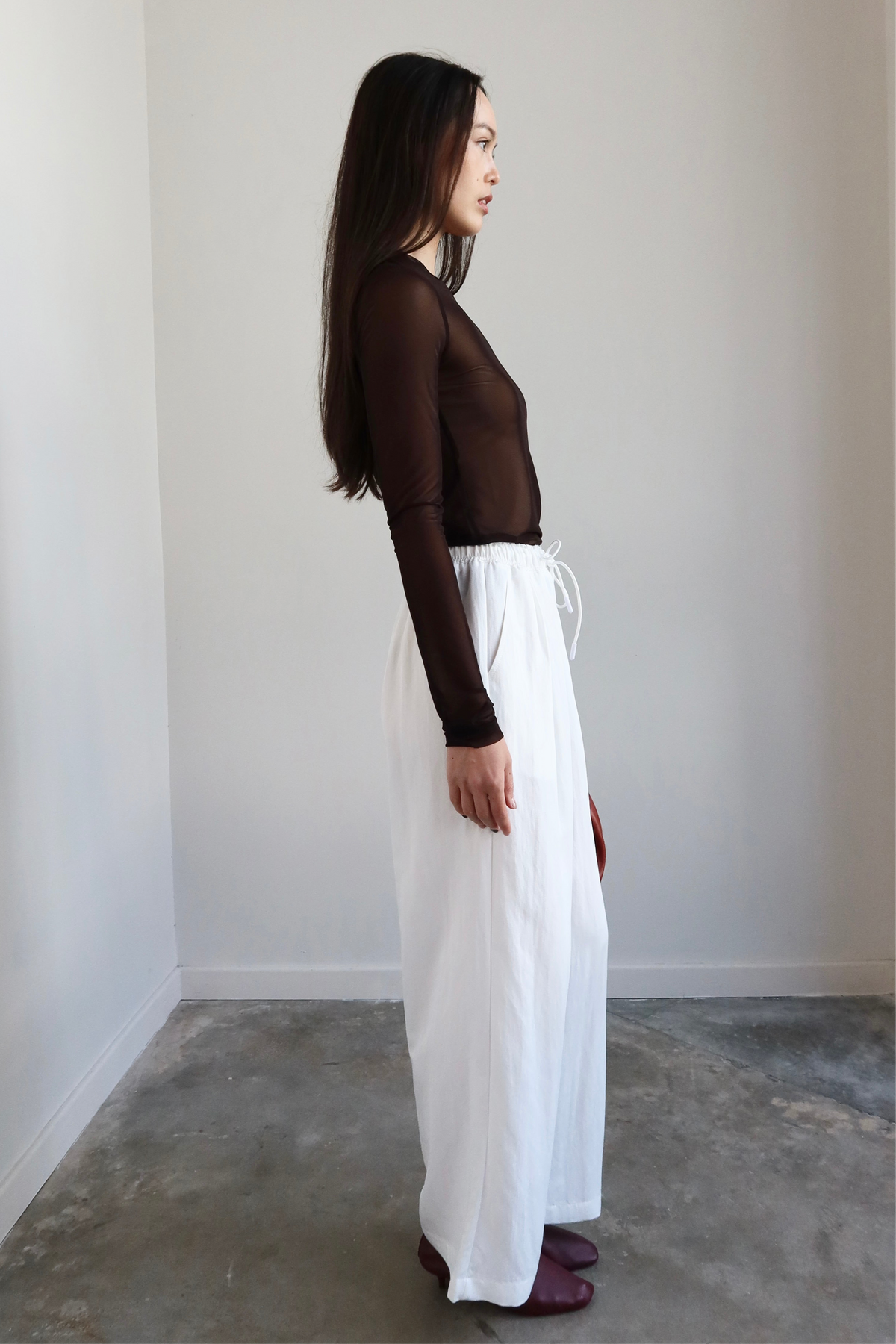 Collective wide-leg pants with soft cotton blend fabric and elastic waistband at Alas Eius