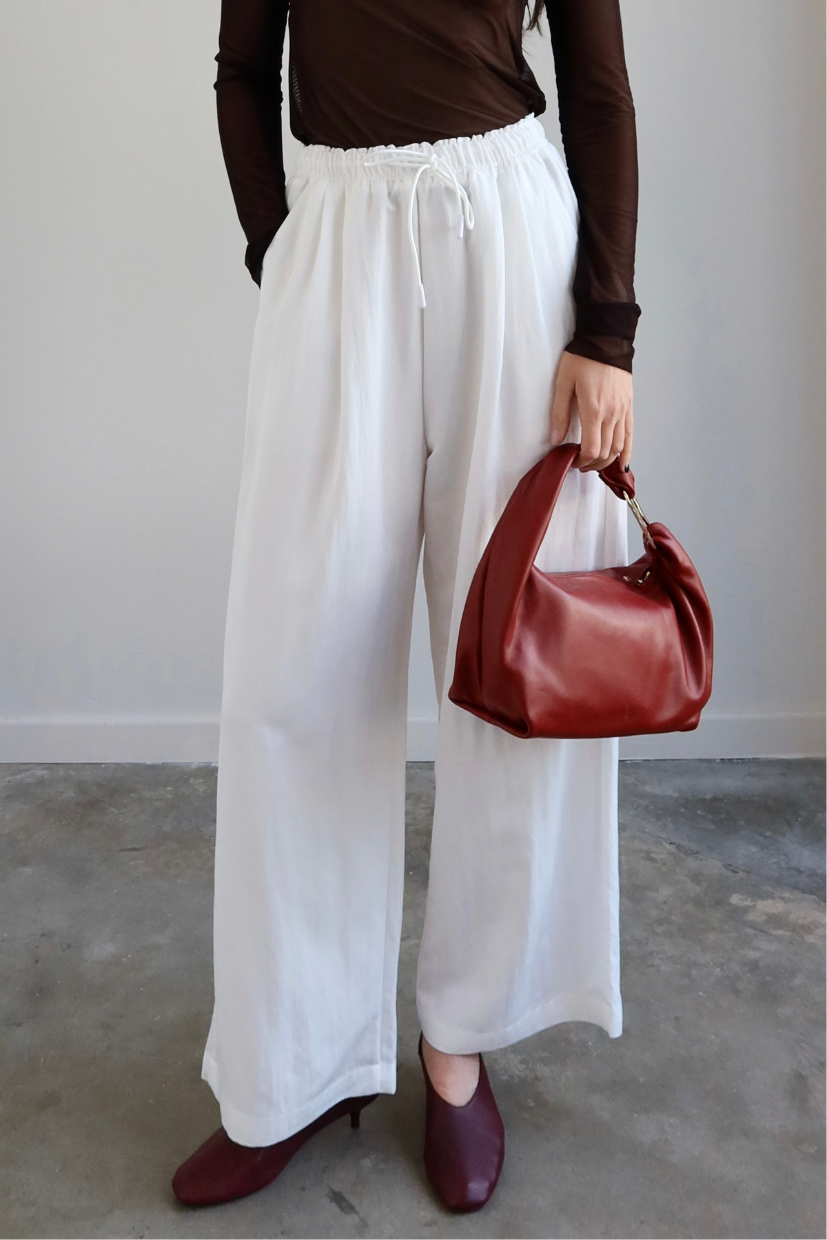 Collective wide-leg cotton blend pants with elastic waistband at Alas Eius