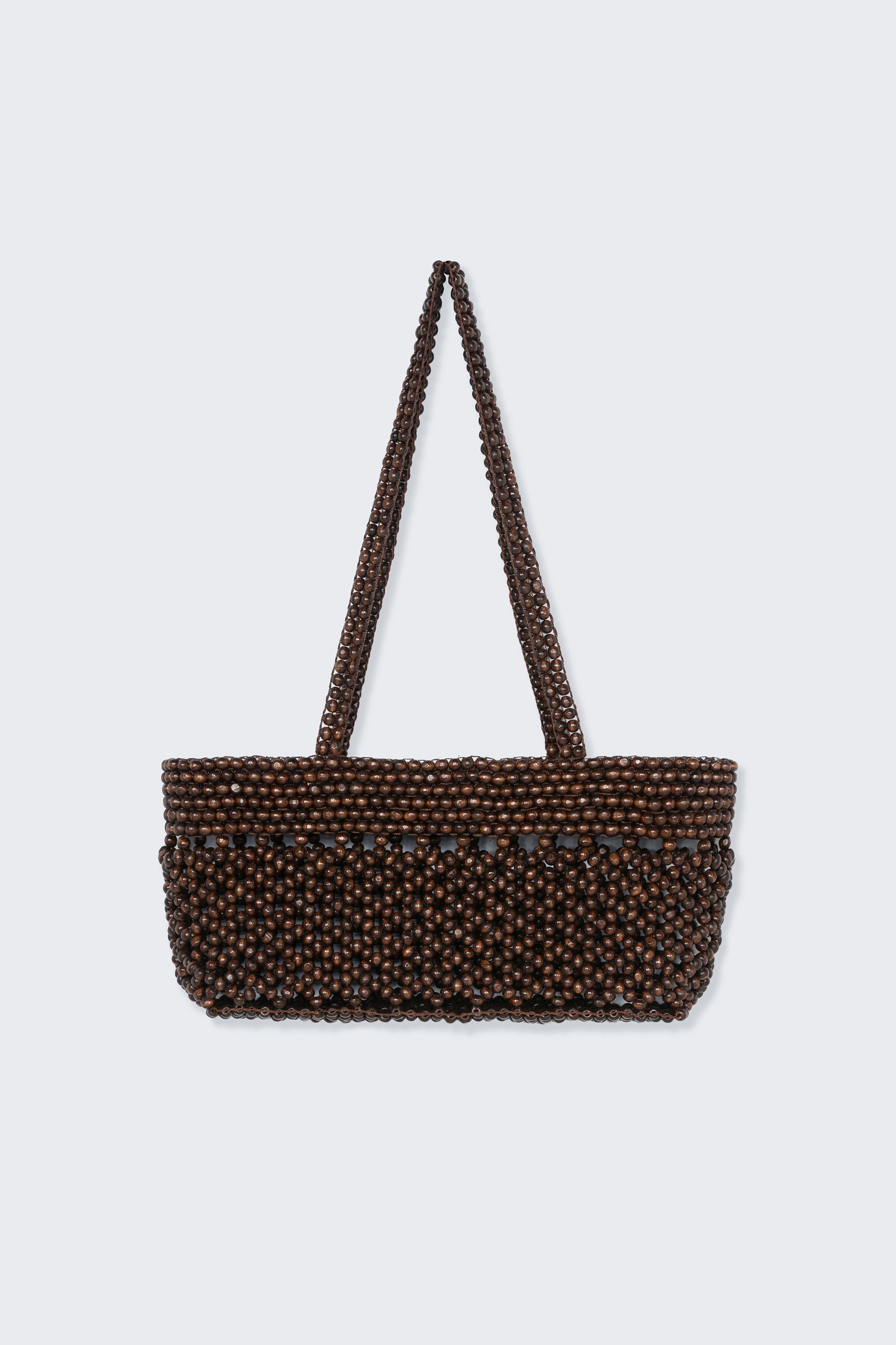 Cordera brown wooden bead mini baguette shaped bag. Adorned with natural wooden beads meticulously strung one by one and it comes with double handles for easy shoulder wear at Alas Eius. 