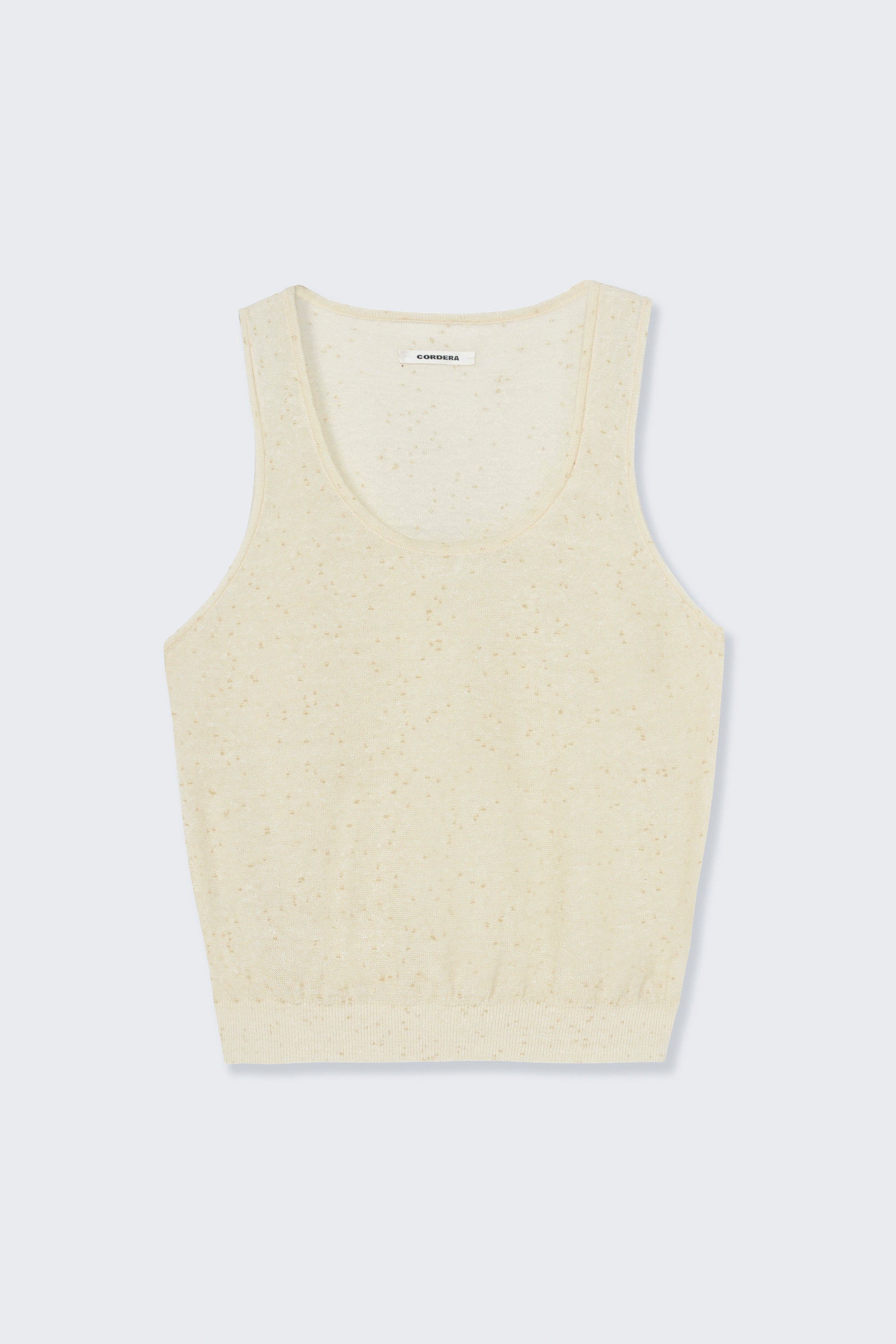 Front product view of the Cordera cream linen and cotton blend flecked tank top at Alas Eius.

This cardigan is ethically and carefully manufactured in La Coruña, with Japanese knitting machines and finished by hand. Made in Spain.