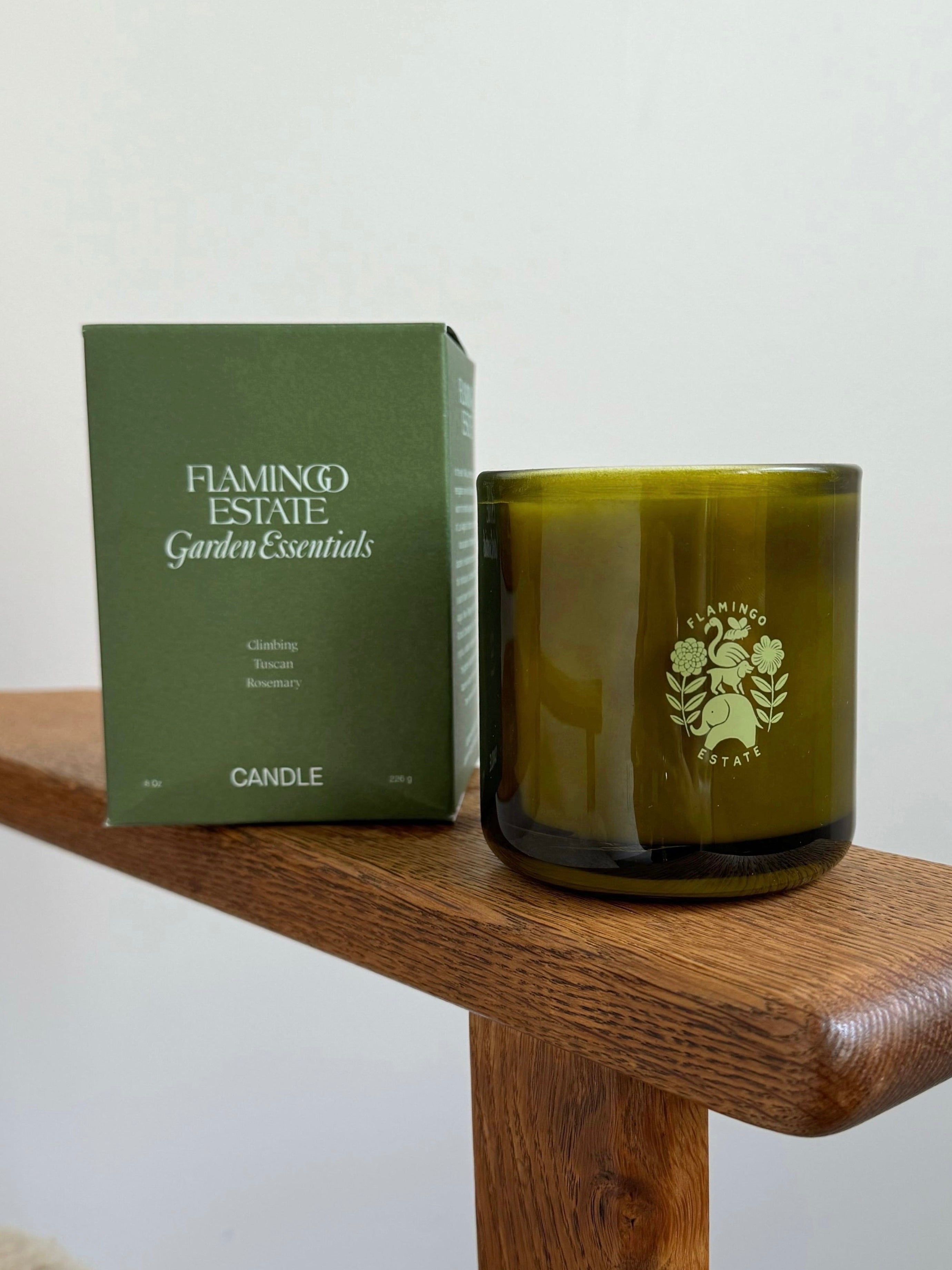 Product and packaging view of the Flamingo Estate Climbing, Tuscan, Rosemary Candle at Alas Eius