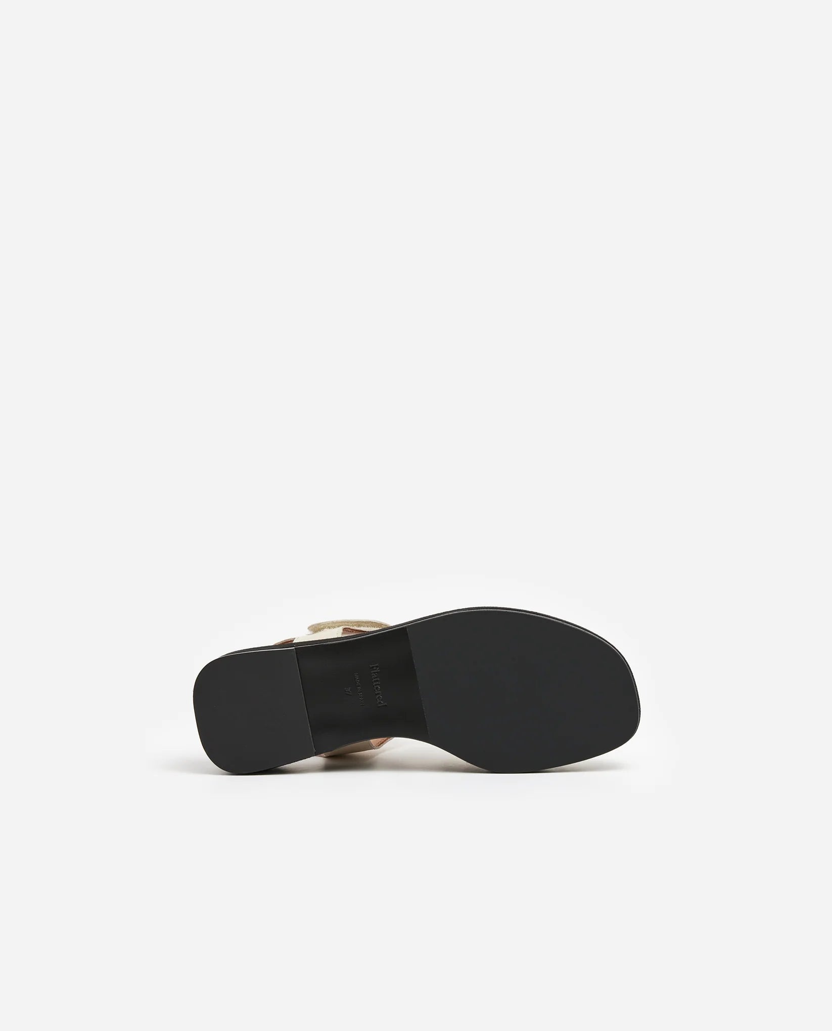 Sole view of a pair of Flattered brand Vanilla White Gigi Leather Fisherman Platform Sandals at Alas Eius