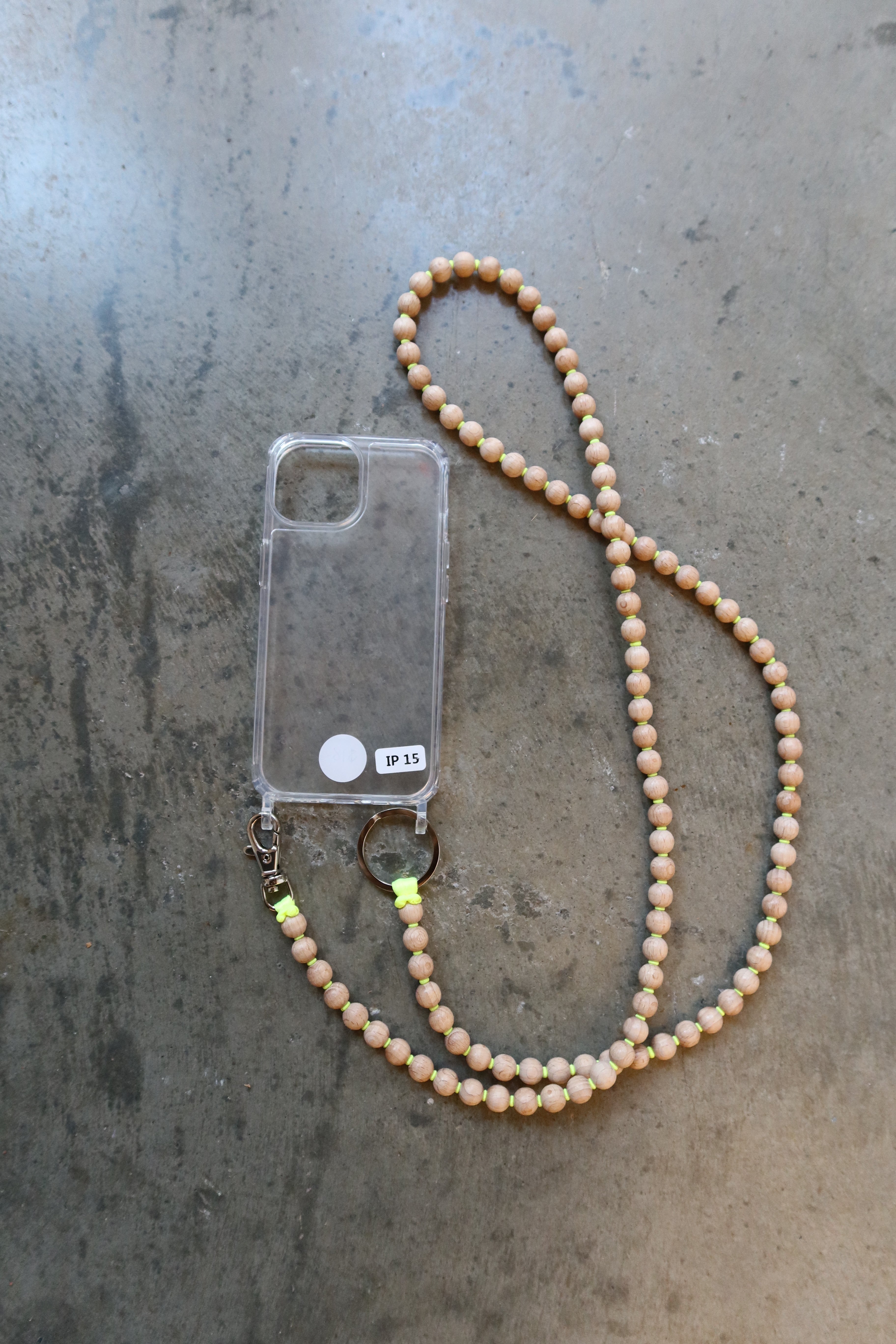 Ina Seifart Elevated Clear iPhone  necklace case. Designed with two hoops on the bottom for easy attachment at Alas Eius.