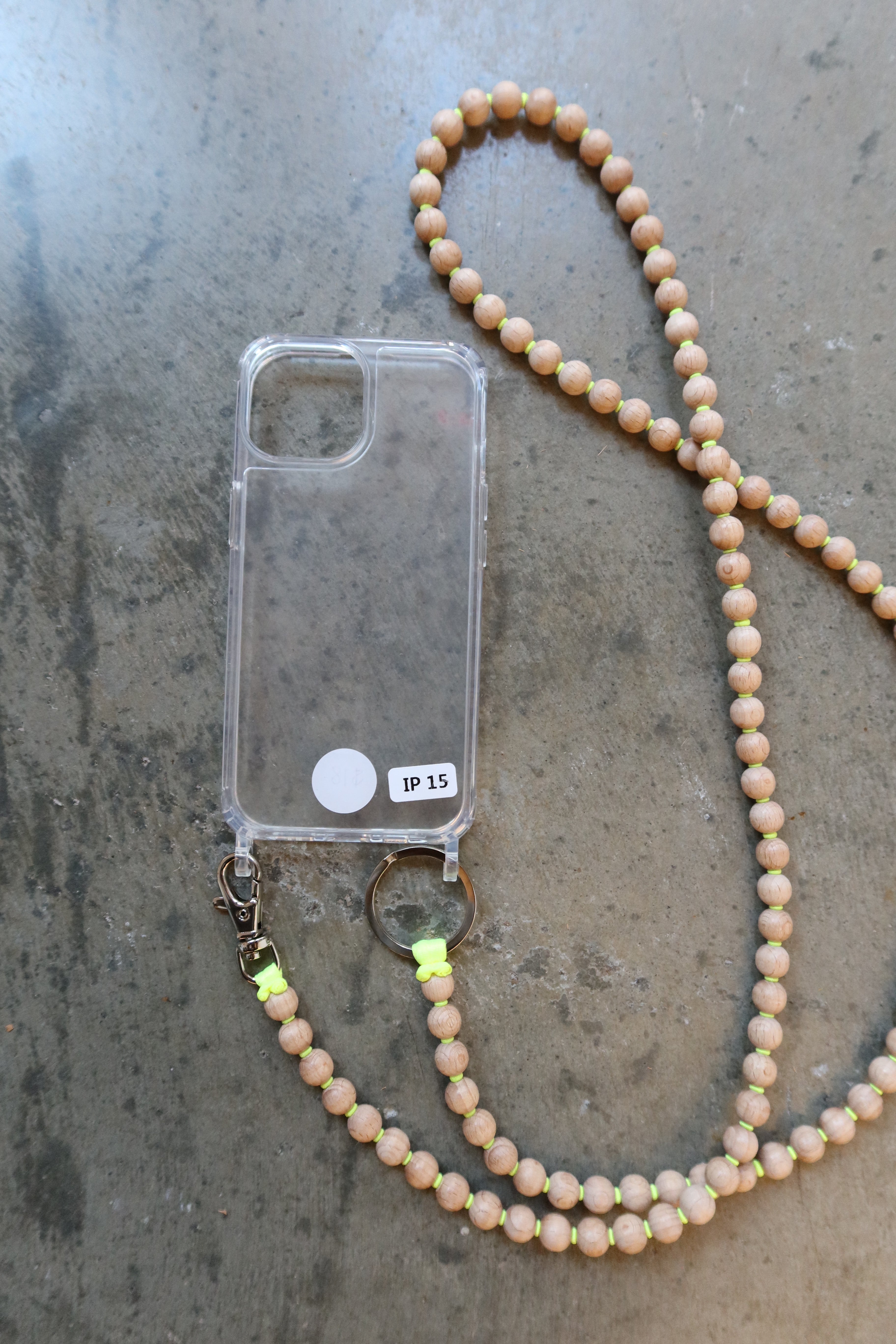 Ina Seifart Elevated Clear iPhone  beaded necklace case. Designed with two hoops on the bottom for easy attachment at Alas Eius.