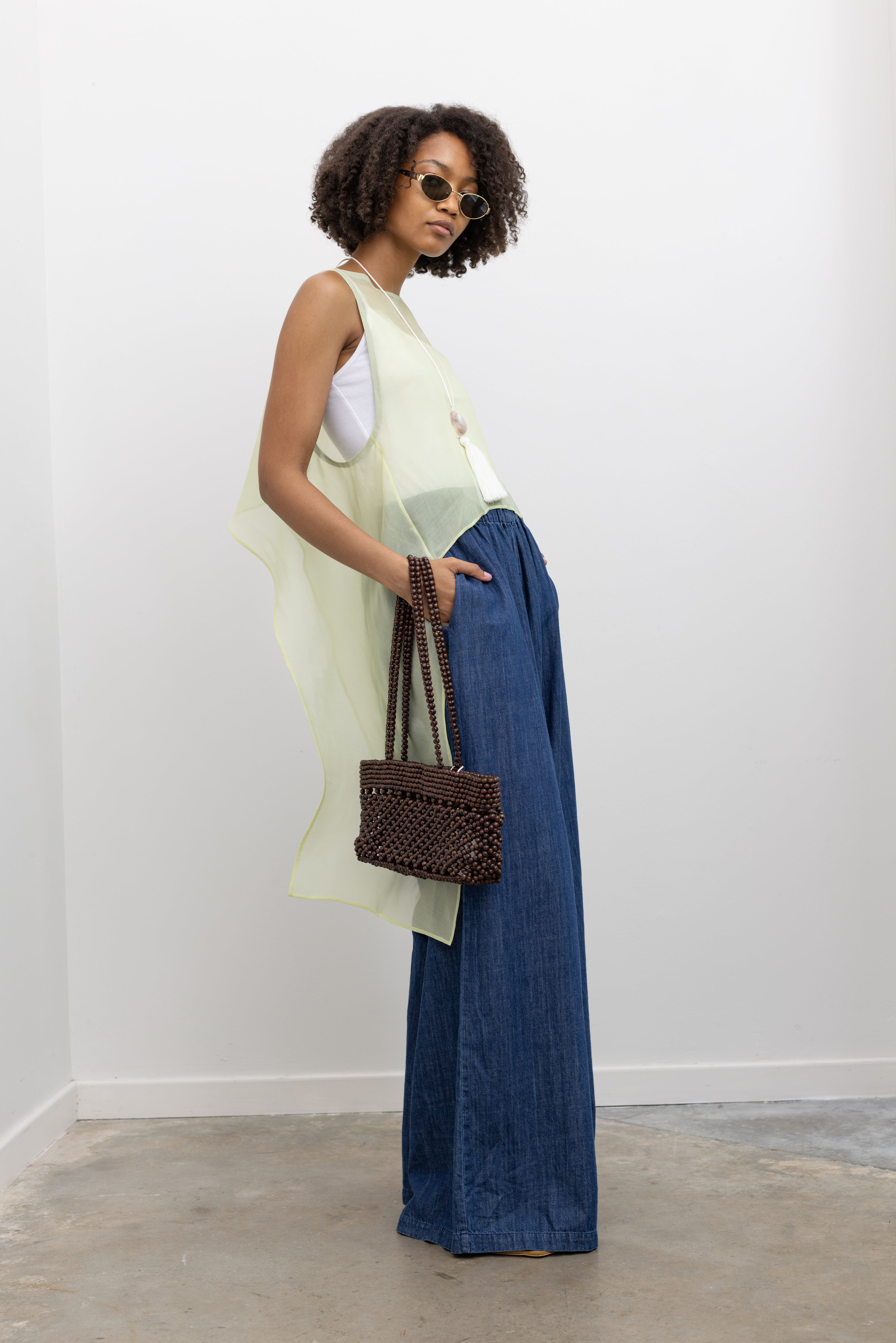 KAAREM Transparent silk organza layering piece with elongated side detailing and soft sculptural drape at Alas Eius.