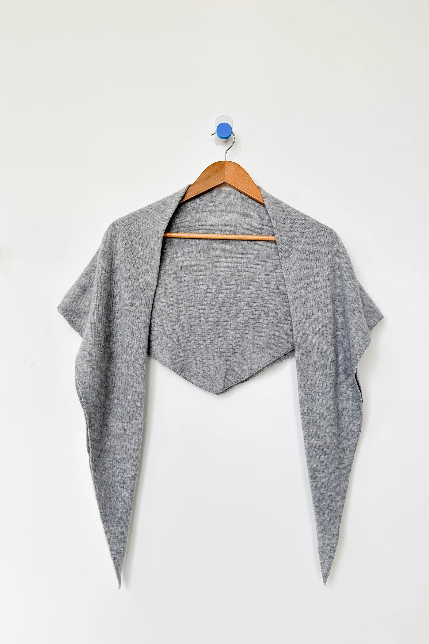 Winter fashion accessory Le Bon Shoppe Gray Cashmere Wool blend bandana Shawl on a wooden hanger at Alas Eius 