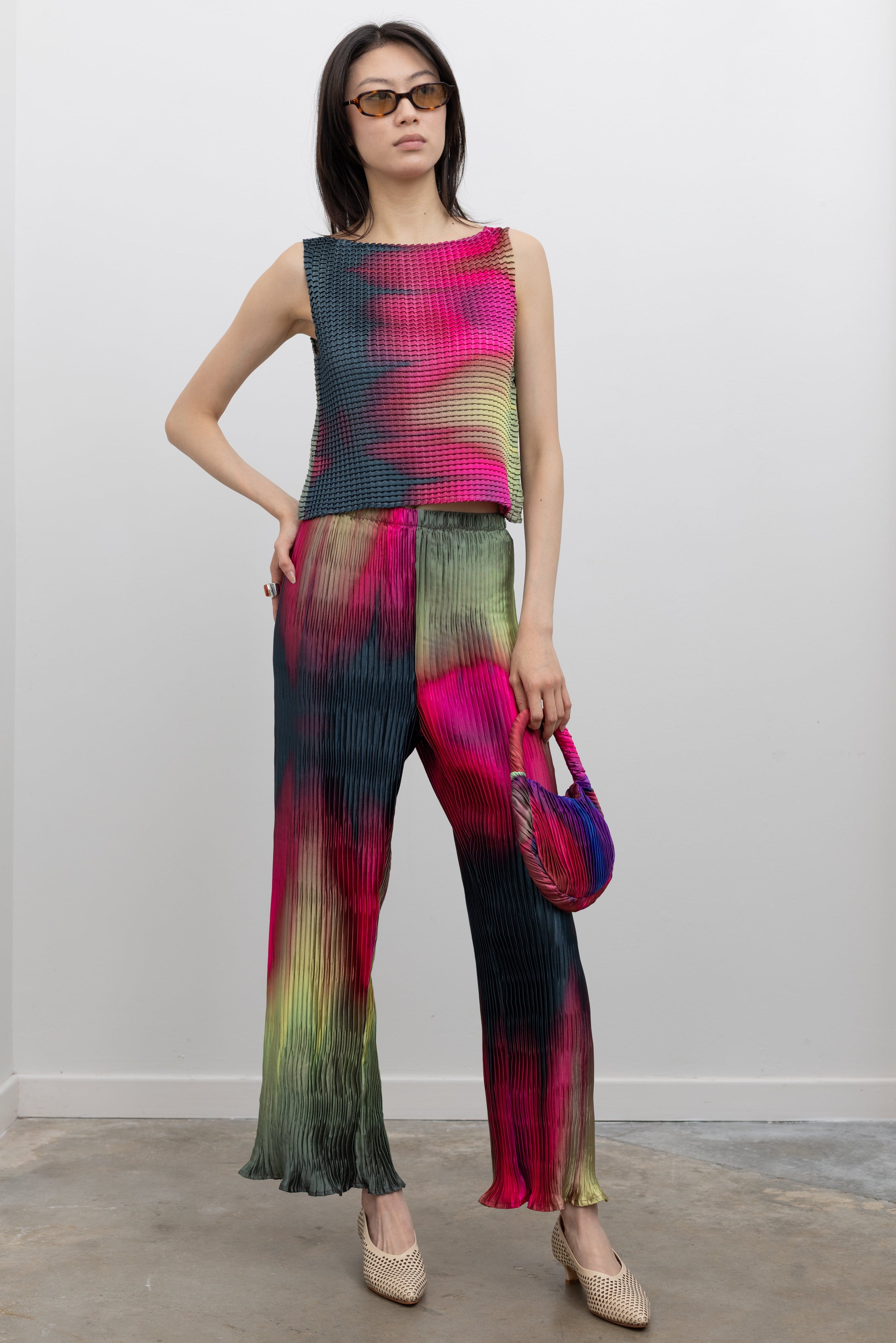Nin Studio Vermis Simple Pant featuring wave pleat design, elastic waist straight leg cropped trousers in neon color block finish, statement womens fashion styling at Alas Eius