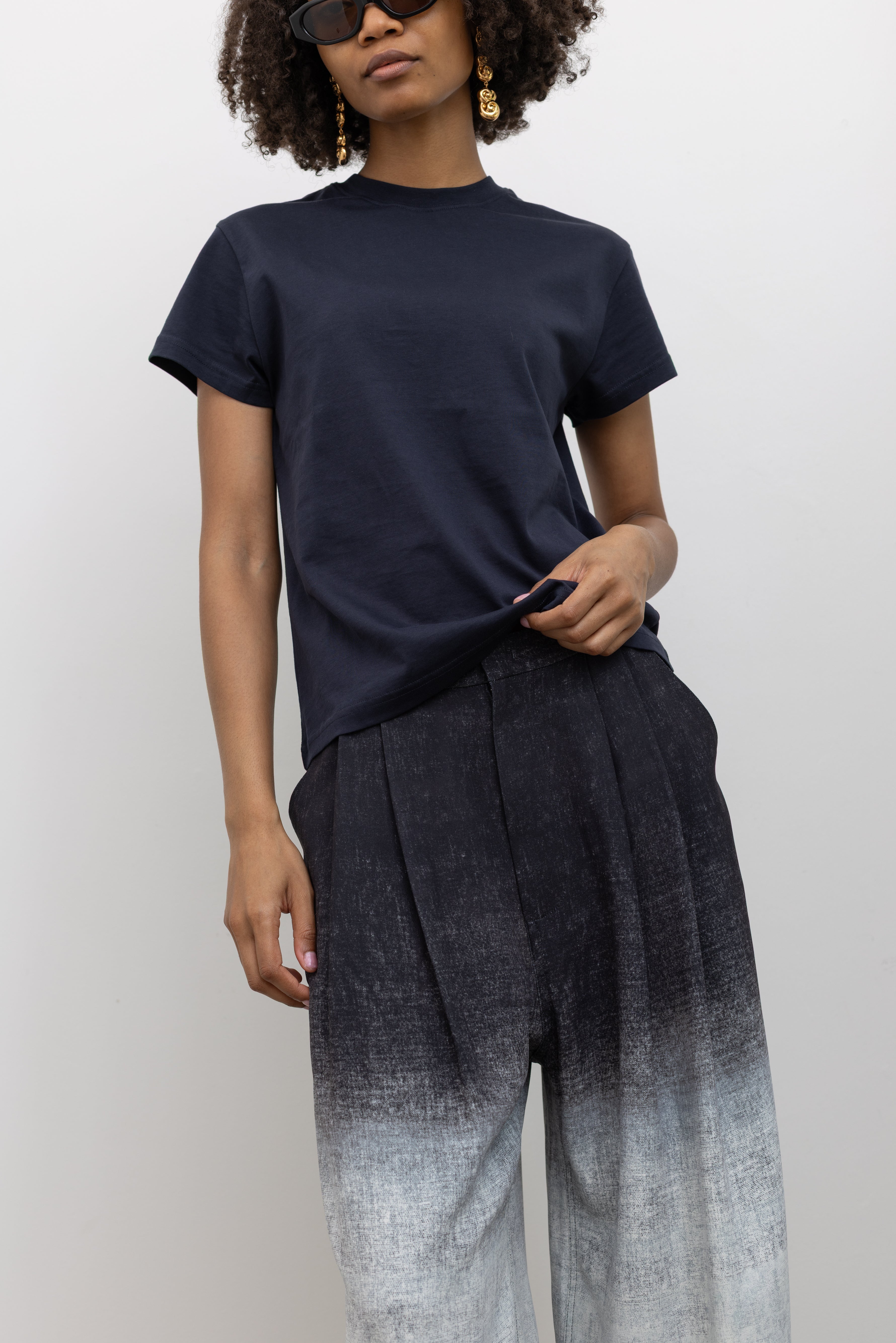 Rachel Comey wide-leg pants with front pleats and a natural drape, designed in an ombre textured fabric at Alas Eius.