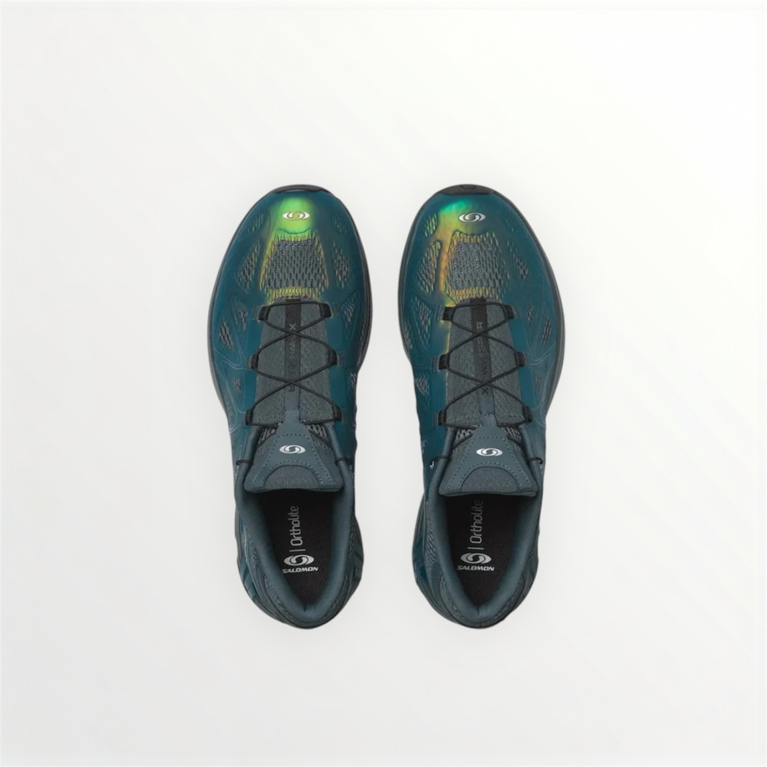 Aerial view of a pair of modern and elevated Salomon XT-Whisper Void Sneakers in a iridescent Dark Slate and Gibraltar Sea colorway featuring quickLACE a minimalistic and strong lace for one-pull tightening and easy-on, easy-off on a white shelf at Alas Eius.