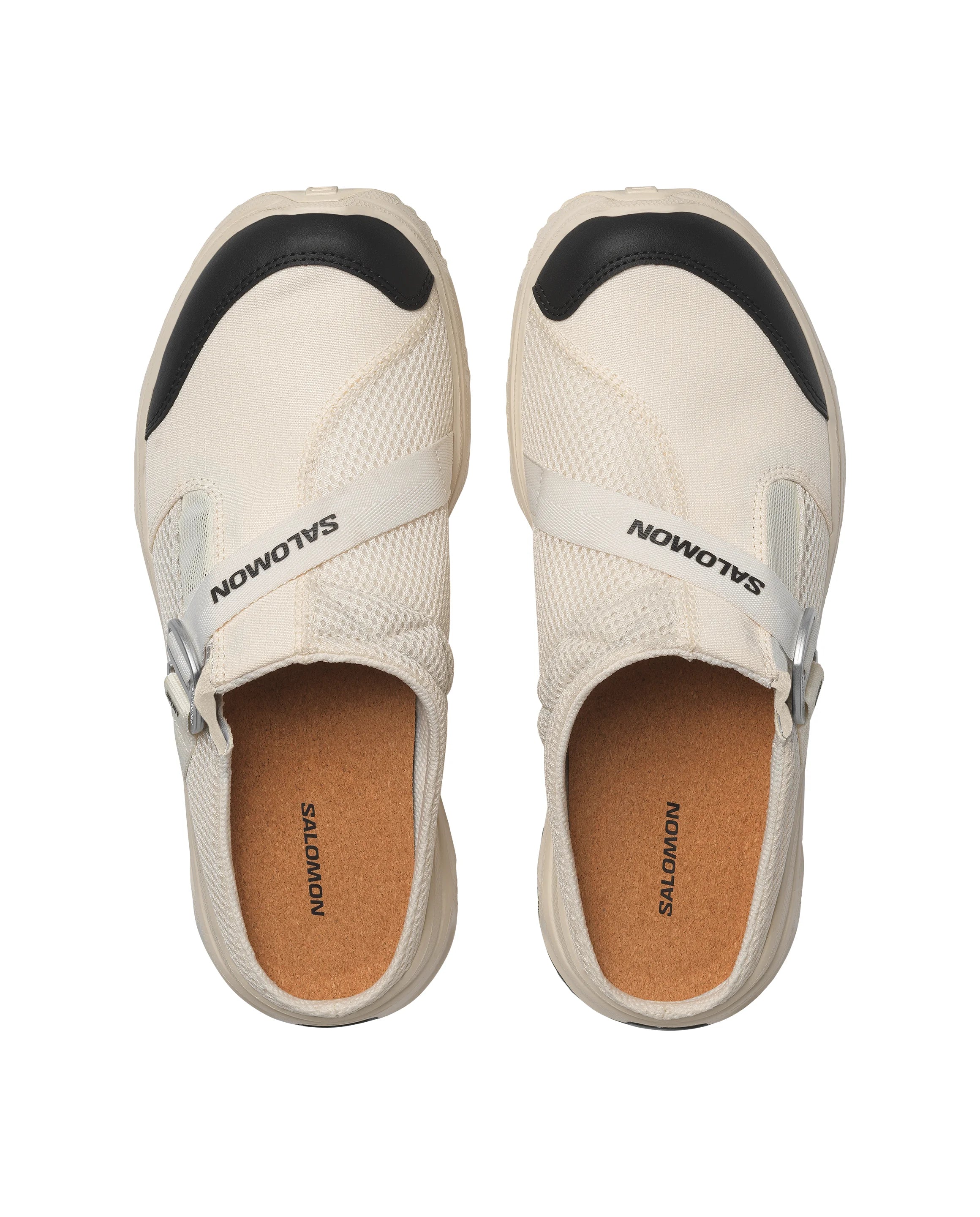 Aerial view of the functional and modern Salomon White RX Slide 3.0 Nomad Shoes with a cork insole on a white background at Alas Eius