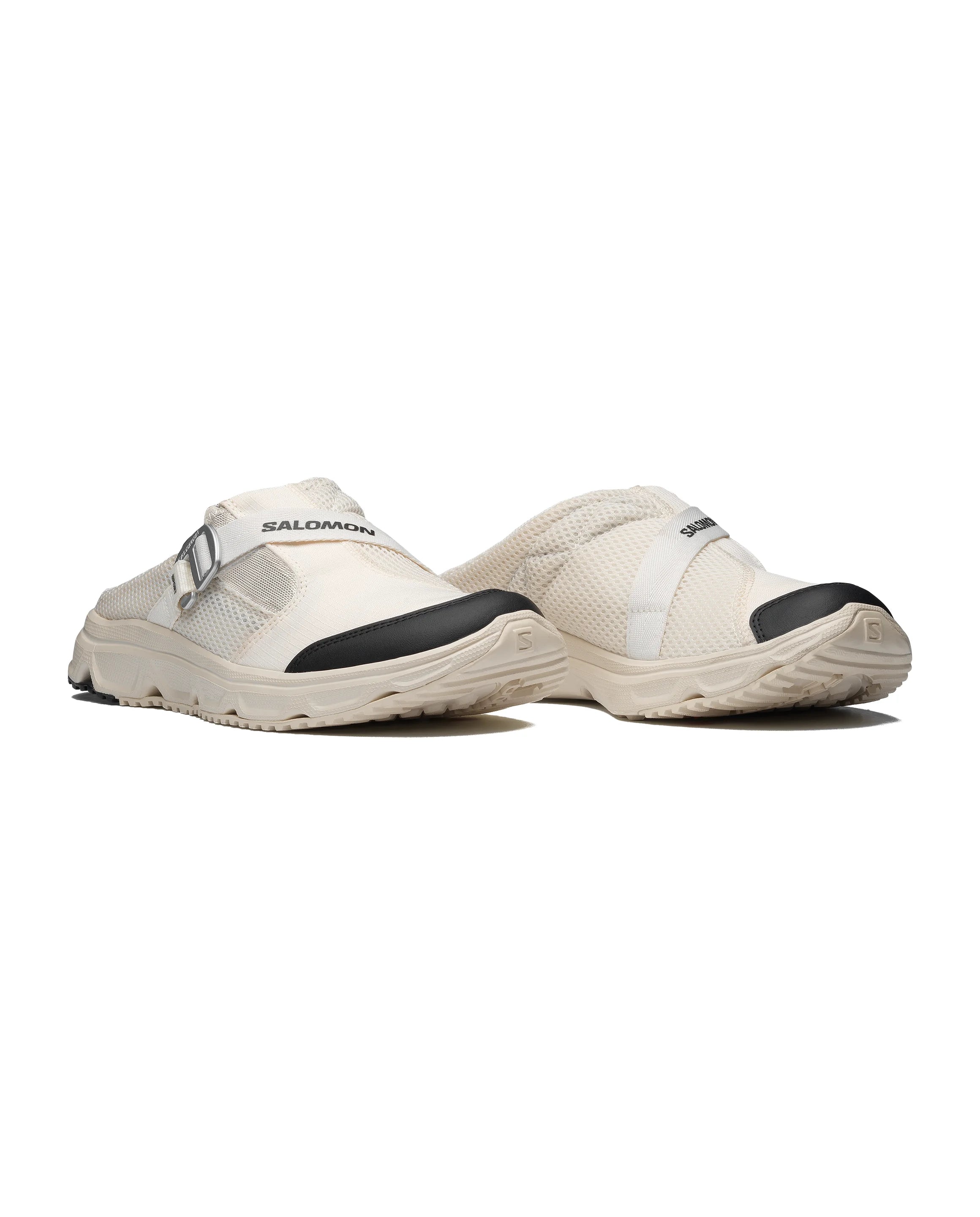 3/4 view of the ultra comfortable Salomon White RX Slide 3.0 Nomad Shoes with a cork insole on a white background at Alas Eius