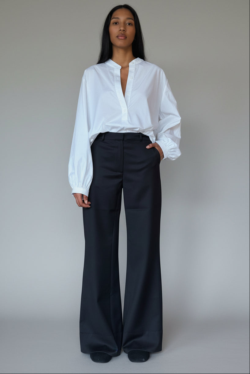 Sloan White Relaxed Blouse with stand collar, button front, and voluminous sleeves at Alas Eius