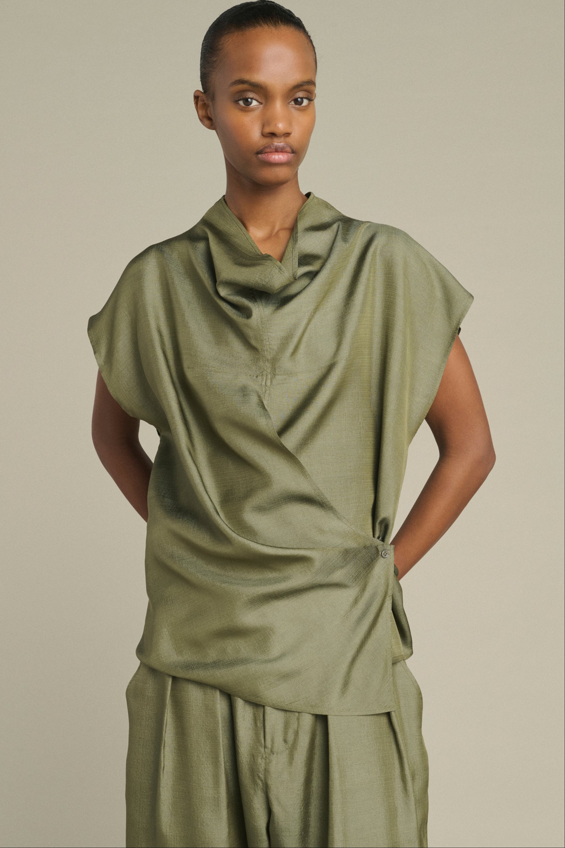 Soeur Kora textured silk sleeveless wrap blouse with high neckline at Alas Eius