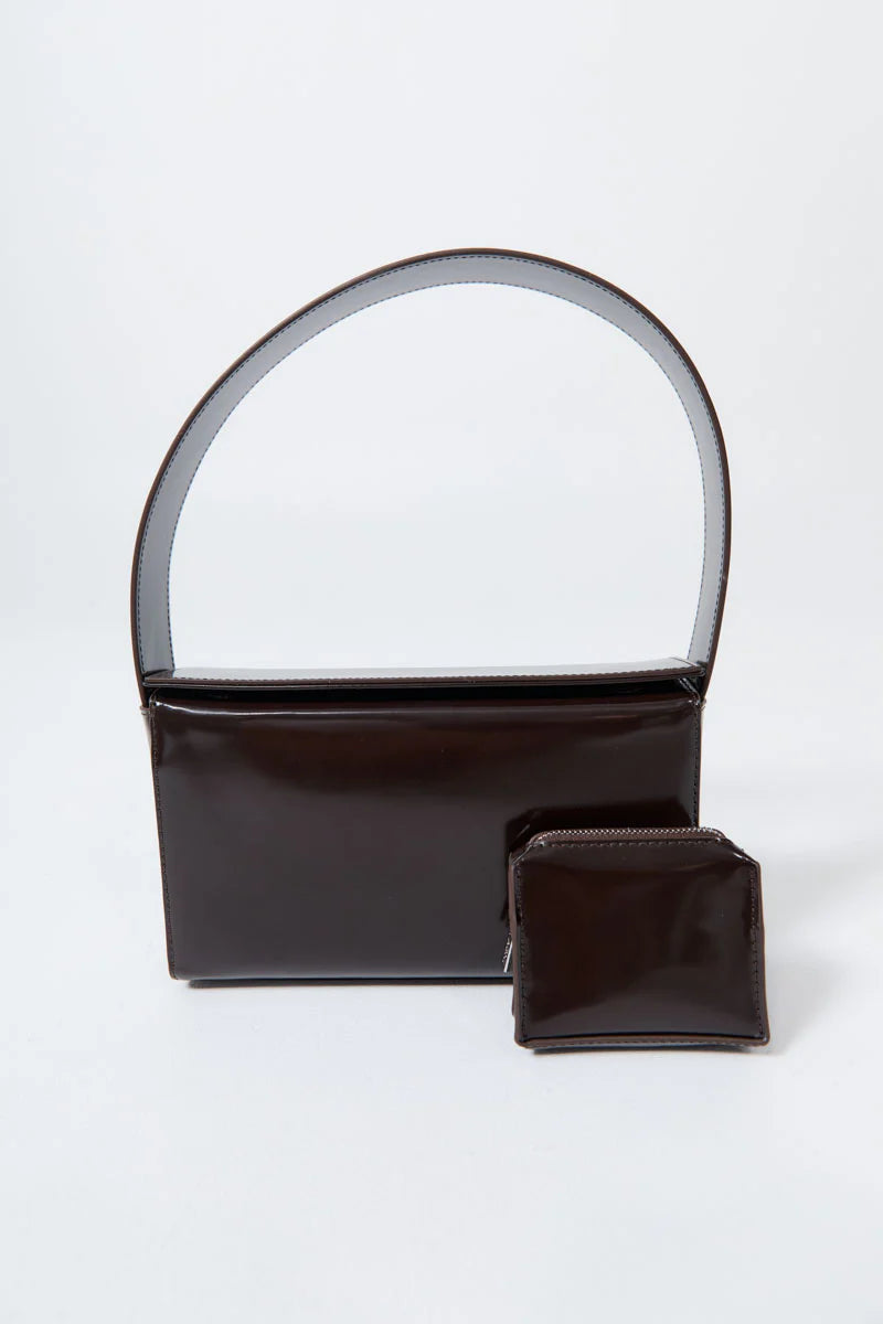Front view of a St. Agni Coffee Brown Polished Leather Petit Pouch Shoulder Bag with removeable zip pouch at Alas Eius 