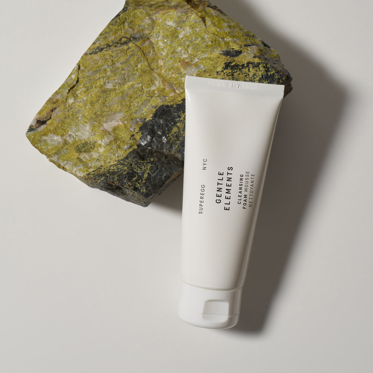 White bottle of non-toxic and anti-aging Superegg Gentle Elements Foaming Cream Cleanser
that is enriched with botanical extracts and antioxidants at Alas Eius