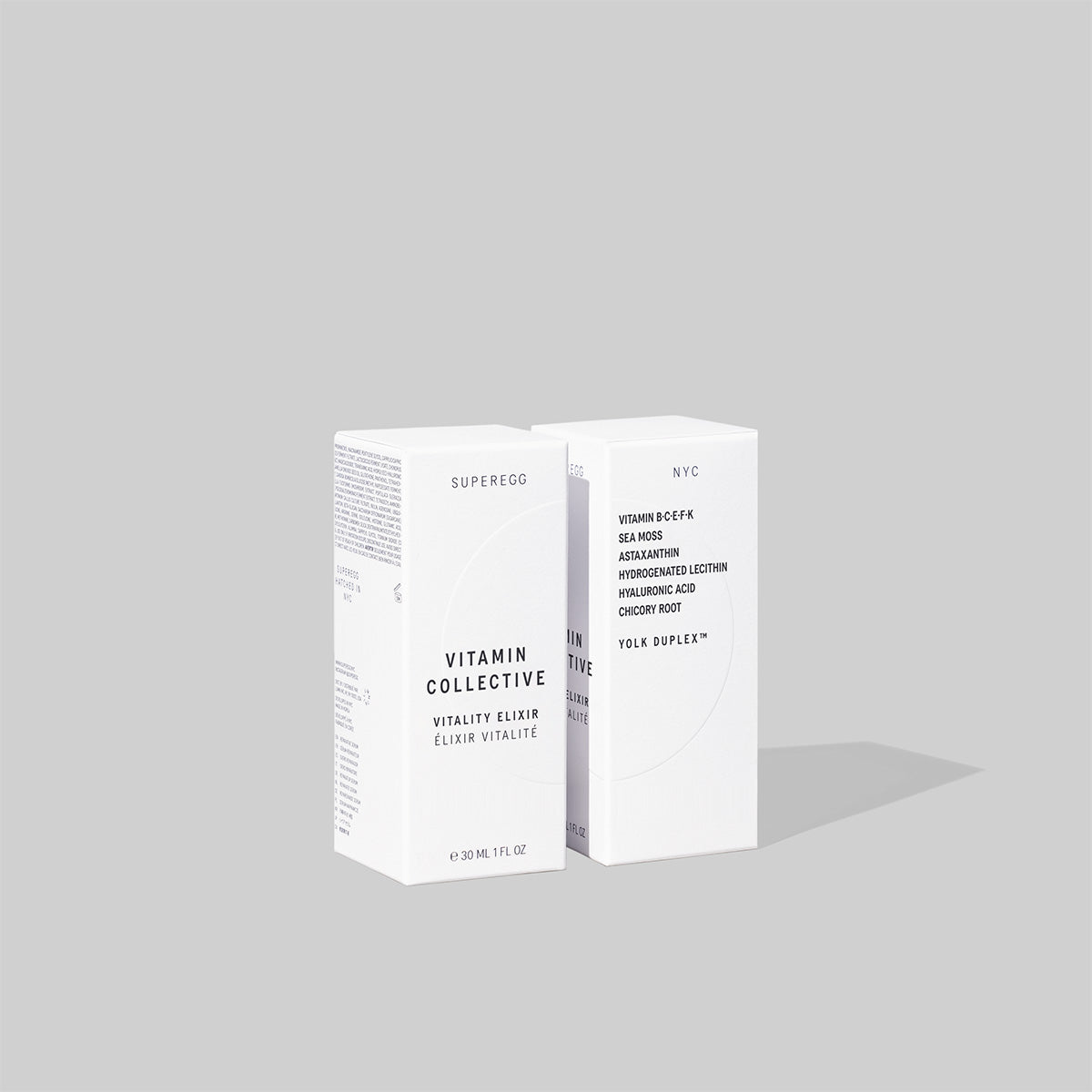 White boxed product packaging of the Superegg Skincare Vitamin Collective Vitality Elixir featuring a brightening treatment serum at Alas Eius.
