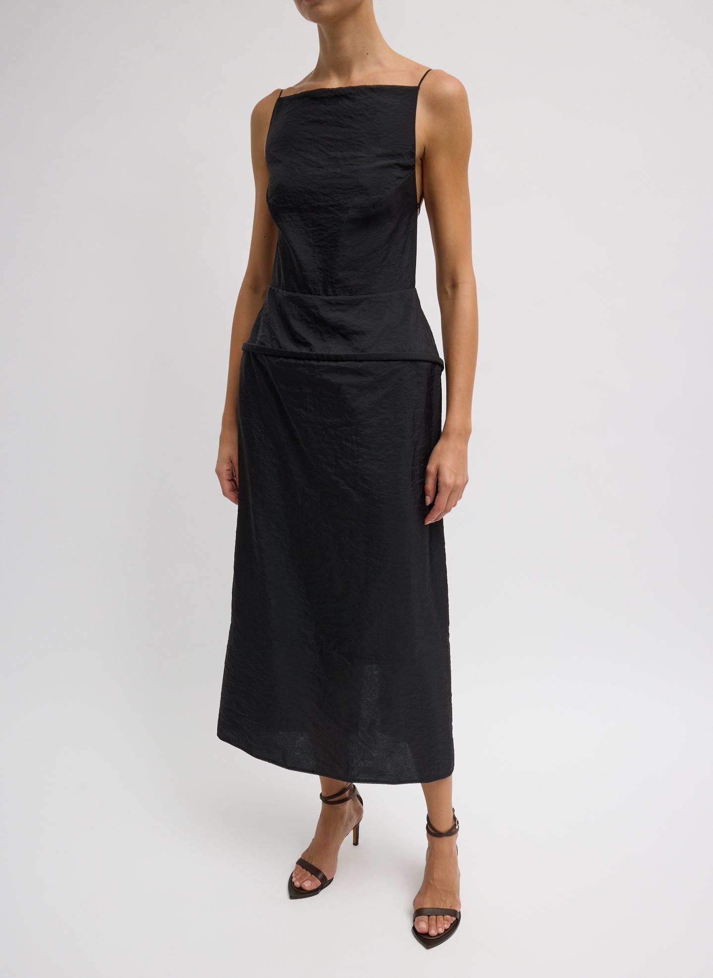 Woman wearing Spring fashion in a Tibi Black Chassis Hoop Strappy Dress at Alas Eius