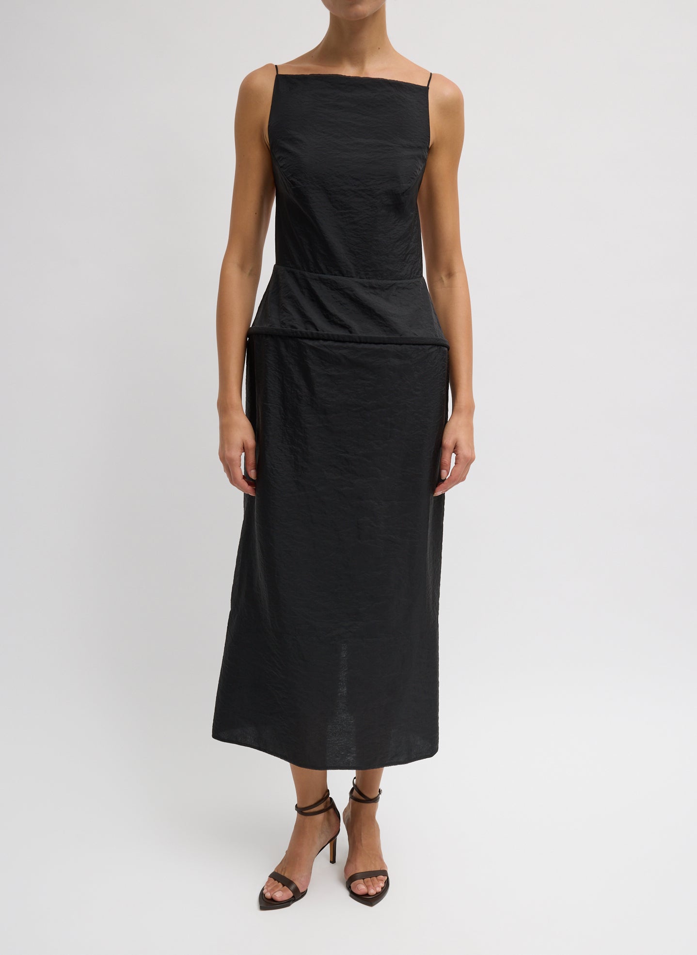 Woman wearing Spring fashion in a Tibi Black Chassis Hoop Strappy Dress at Alas Eius