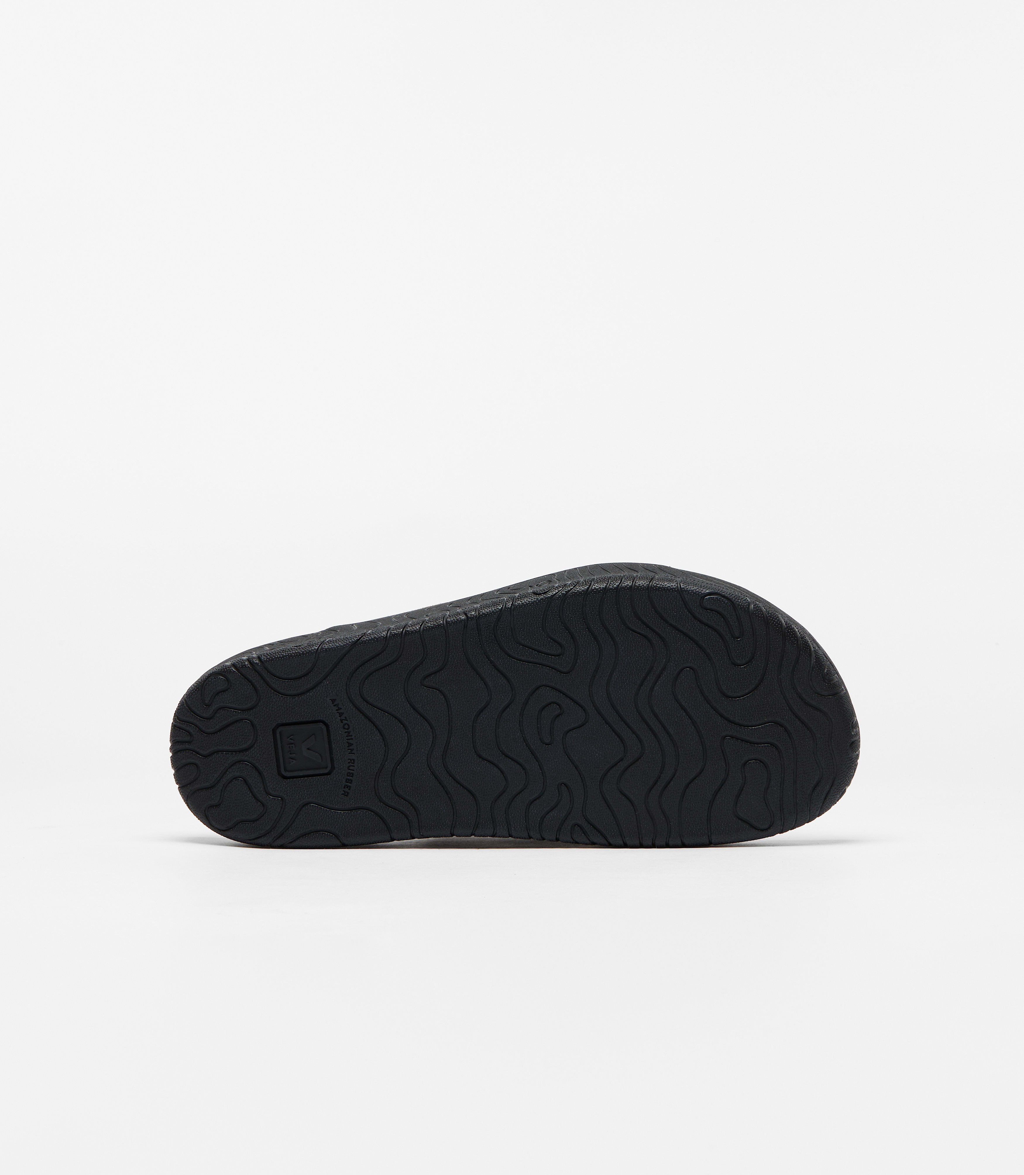 Bottom sole view of the Veja Arpoador slide sandal featuring a vibrant green suede upper with gray adjustable strap set on a soft black footbed and lightweight platform sole at Alas Eius