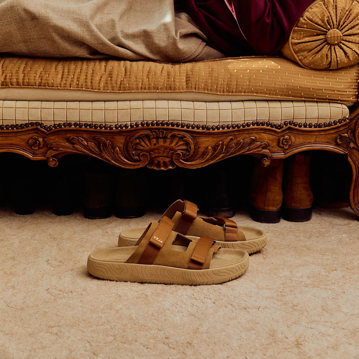 Veja Arpoador slide sandal featuring cognac suede upper with tan adjustable straps set on a beige footbed and lightweight platform sole at Alas Eius.