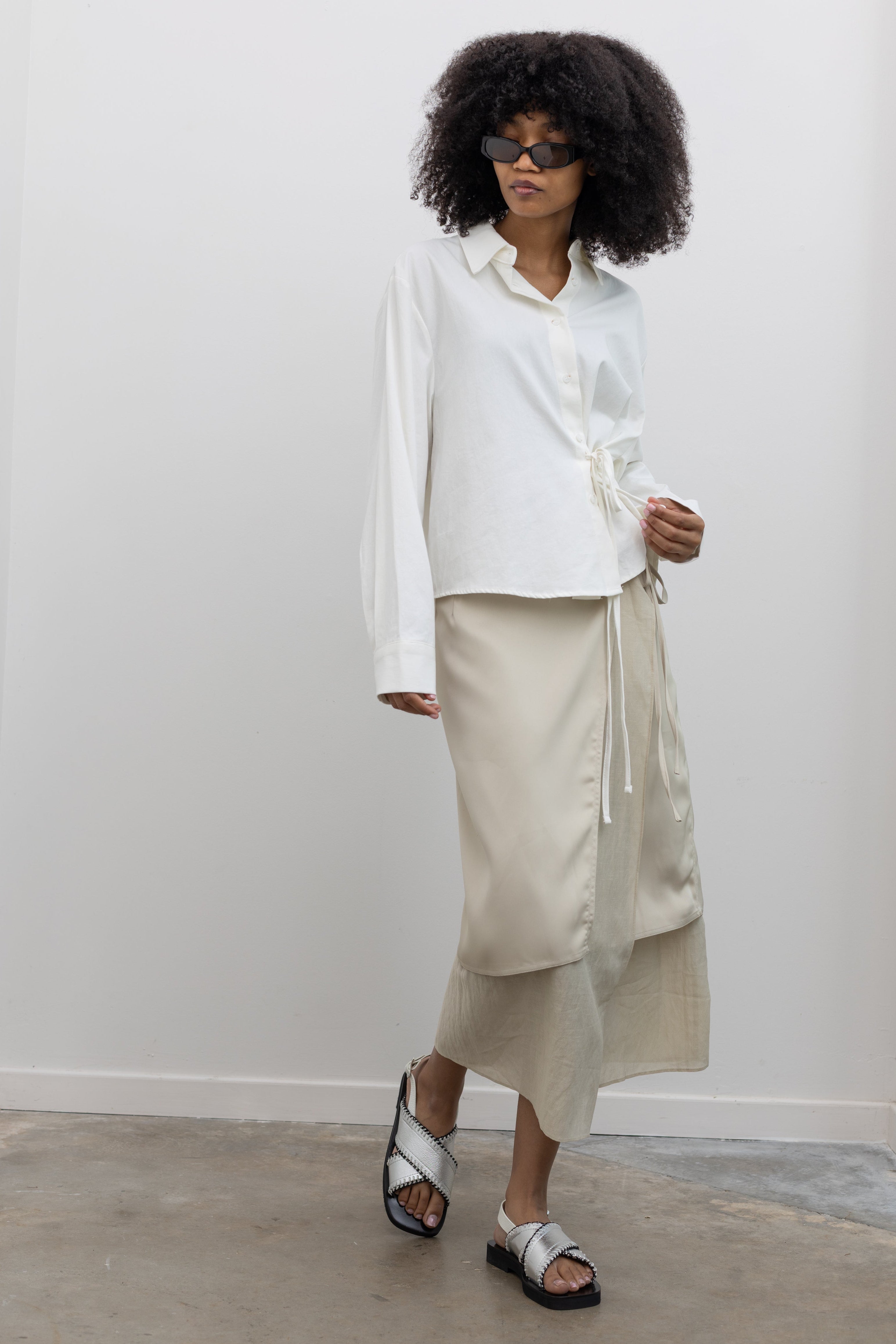 Alas Eius Chic Beige Satin Wrap Skirt with Layered Detail and Fluid Movement at Alas Eius