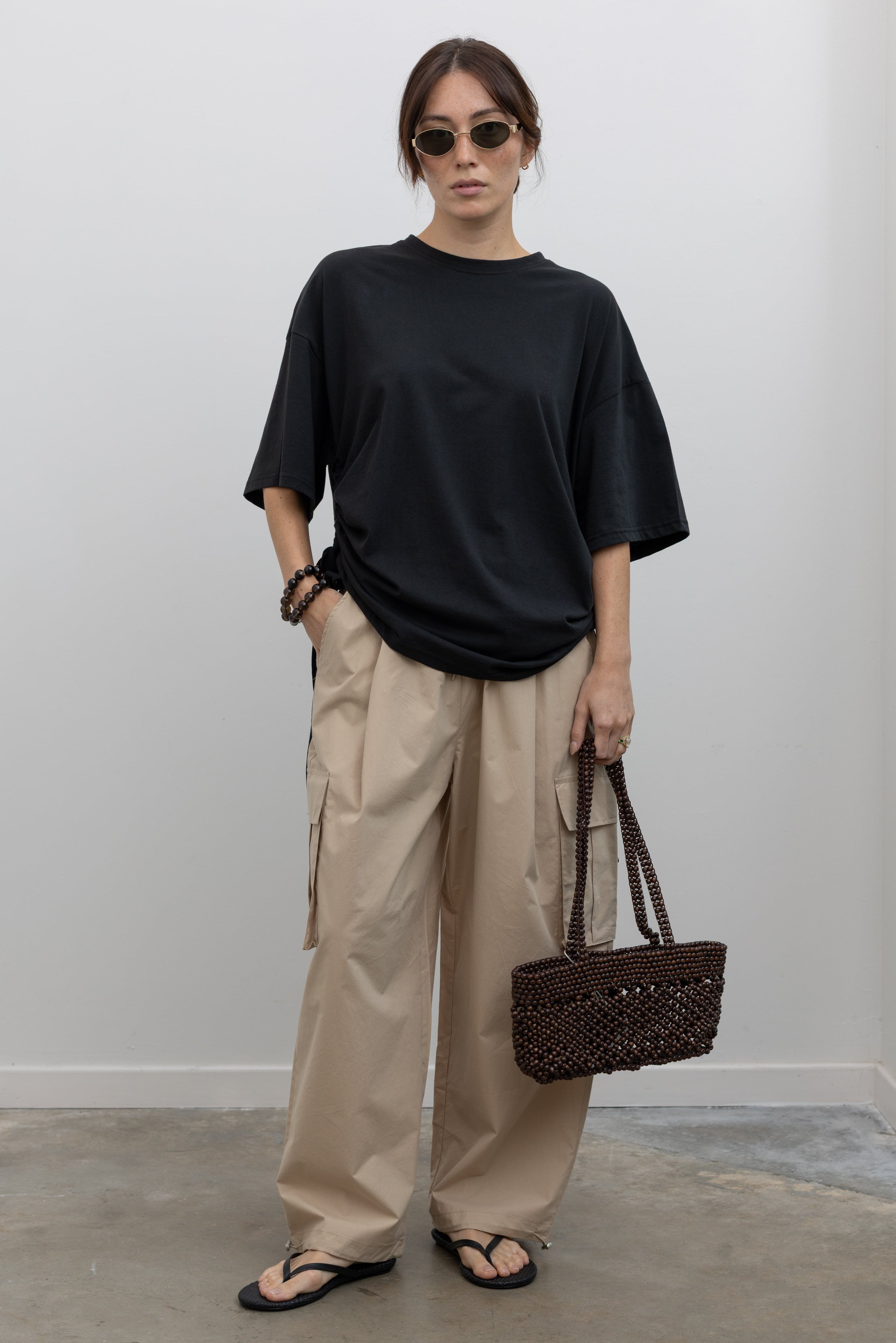 alas eius wide-leg cotton cargo pants with adjustable bungee hems at alas eius