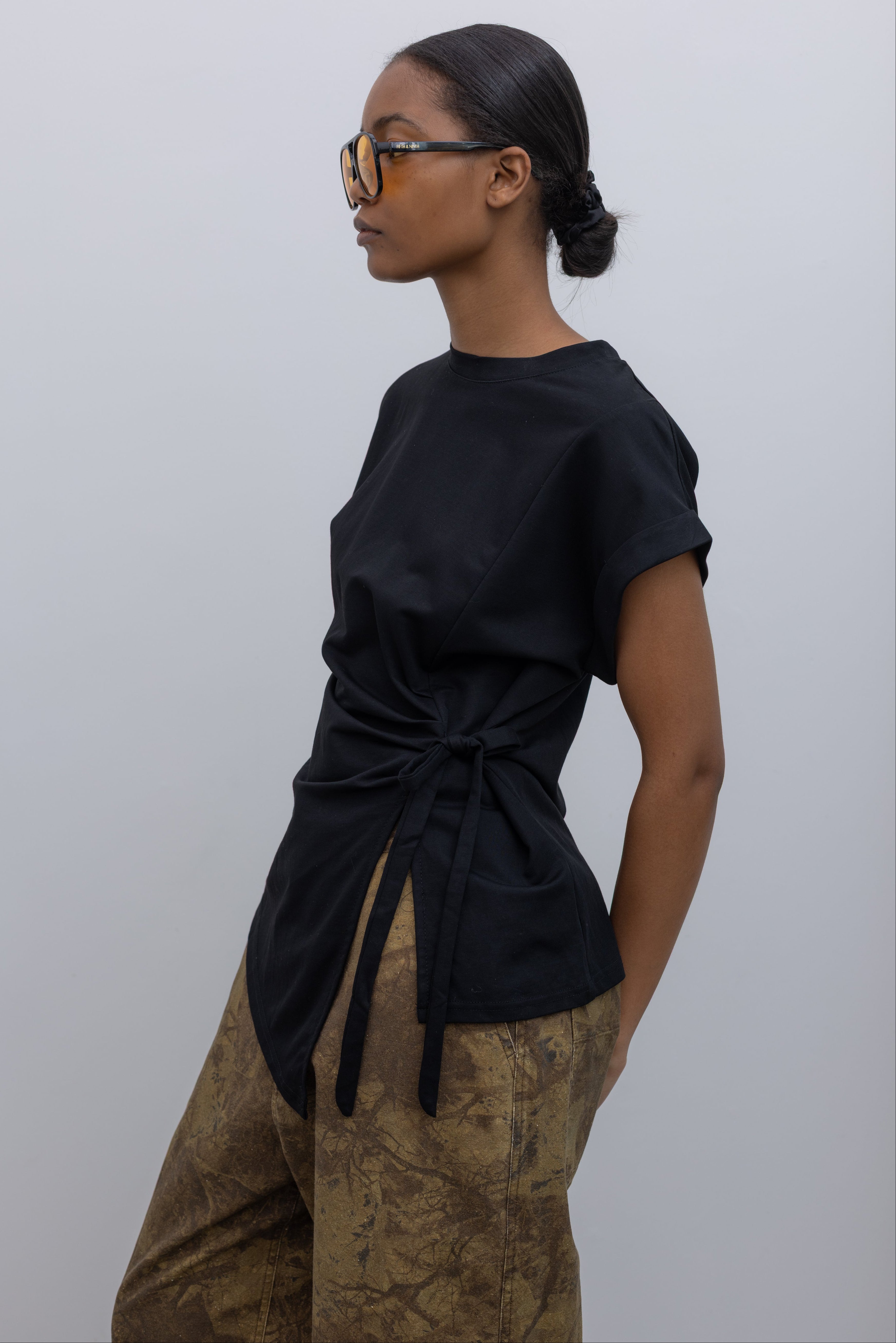 black drop shoulder flattering waist tie top at alas eius