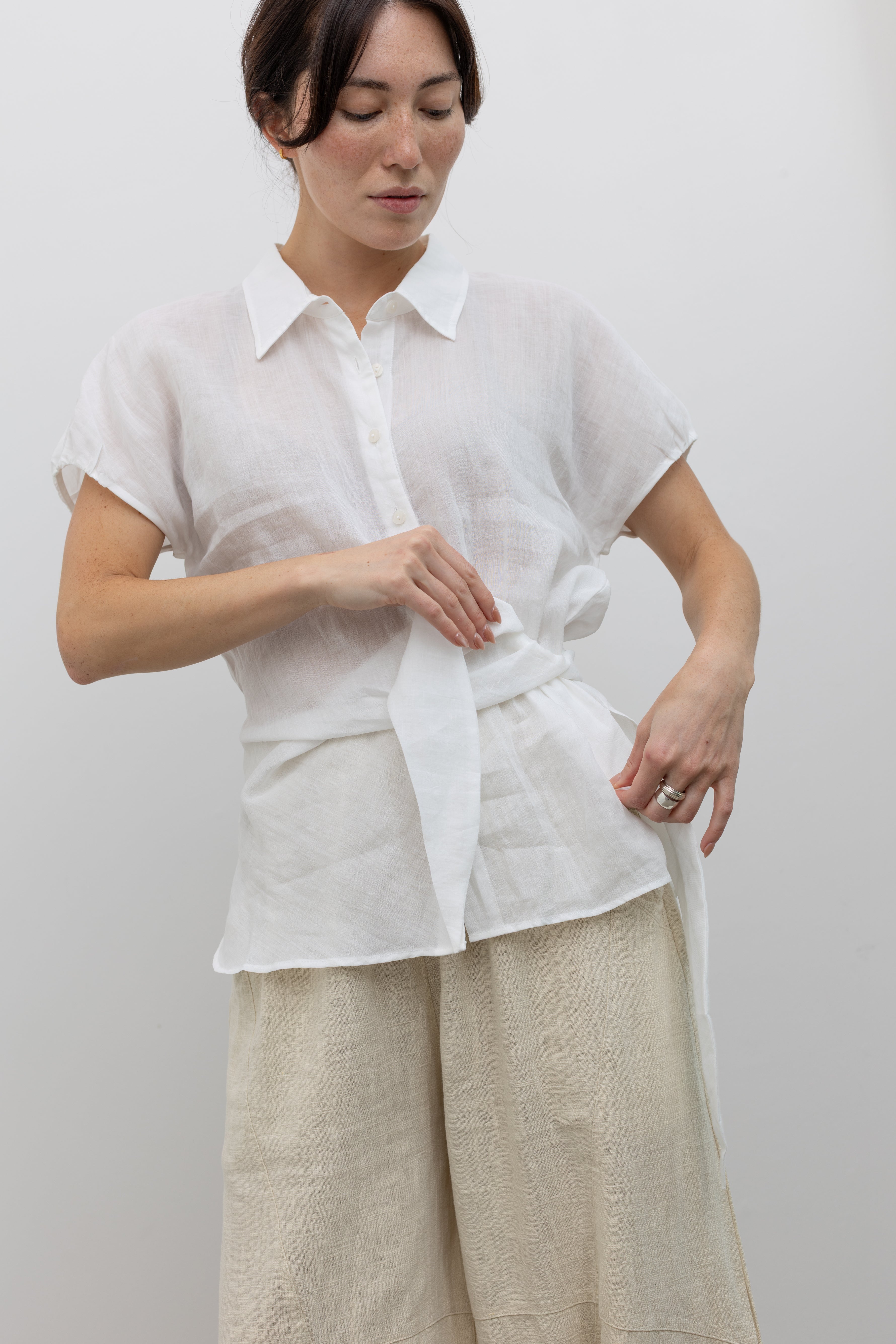 Collective breathable relaxed tunic with modern side tie detail at Alas Eius