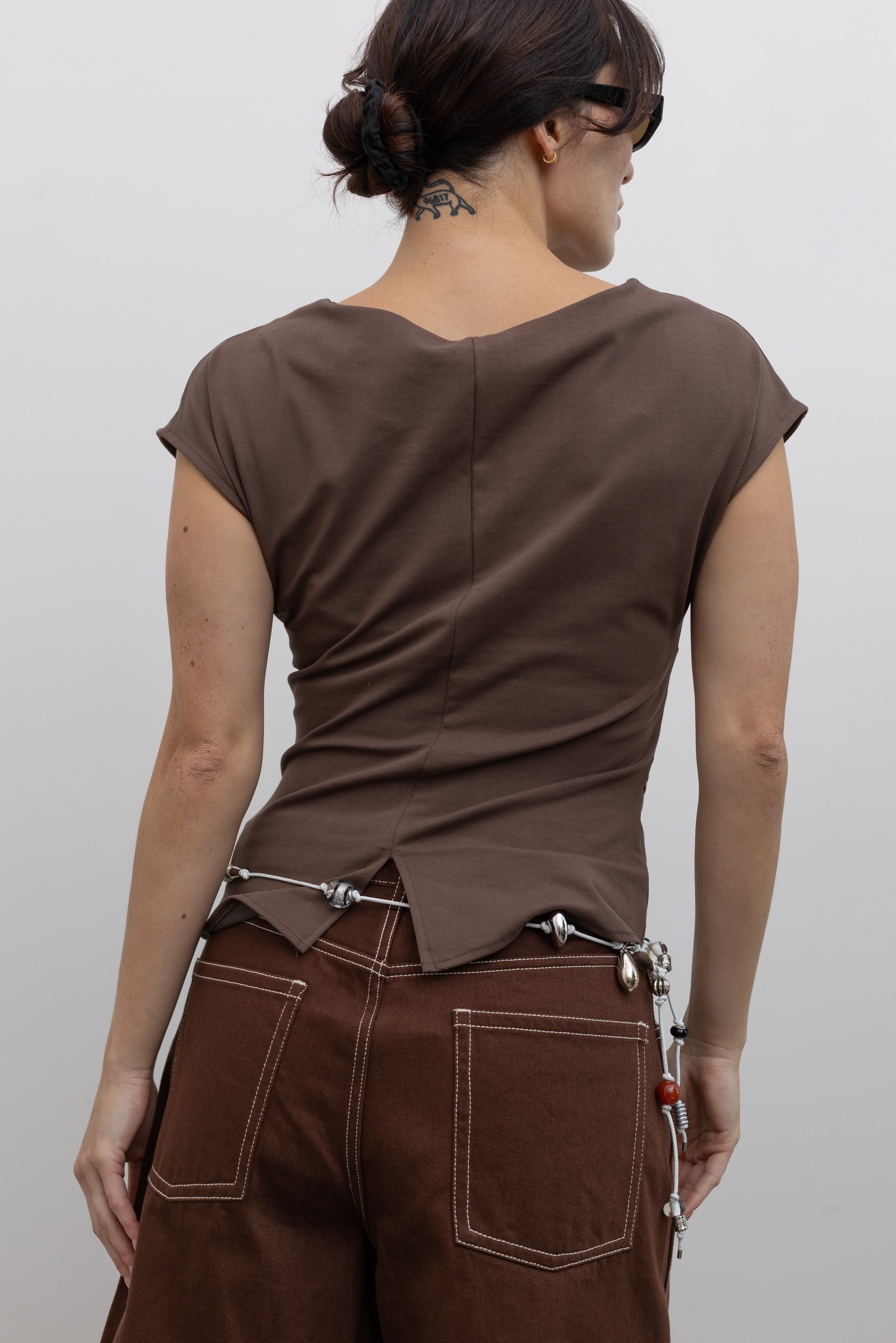 Collective brown asymmetrical ruched top with bateau neckline and modern silhouette at Alas Eius