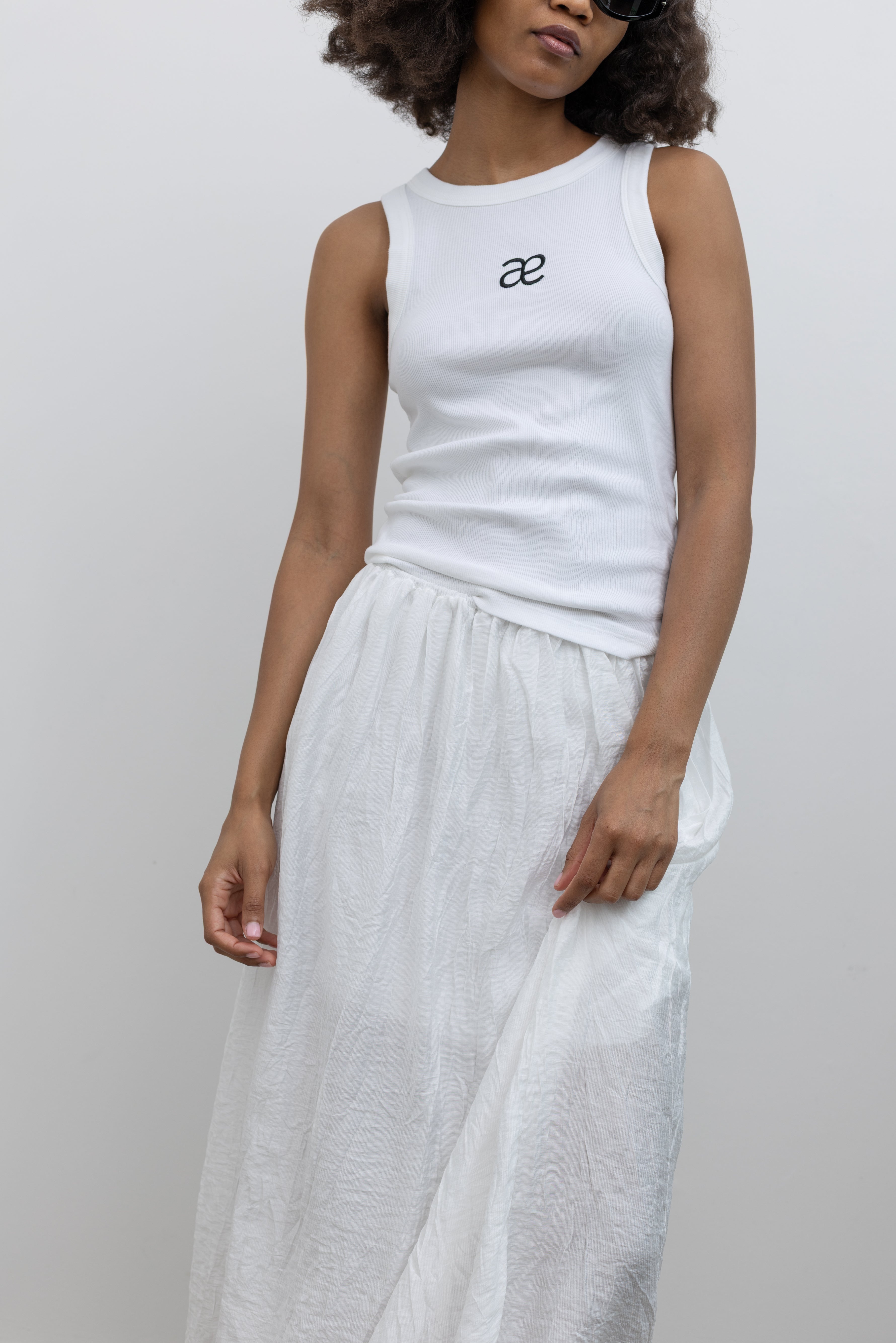 Collective airy cotton blend midi skirt with a relaxed wrinkled finish at Alas Eius