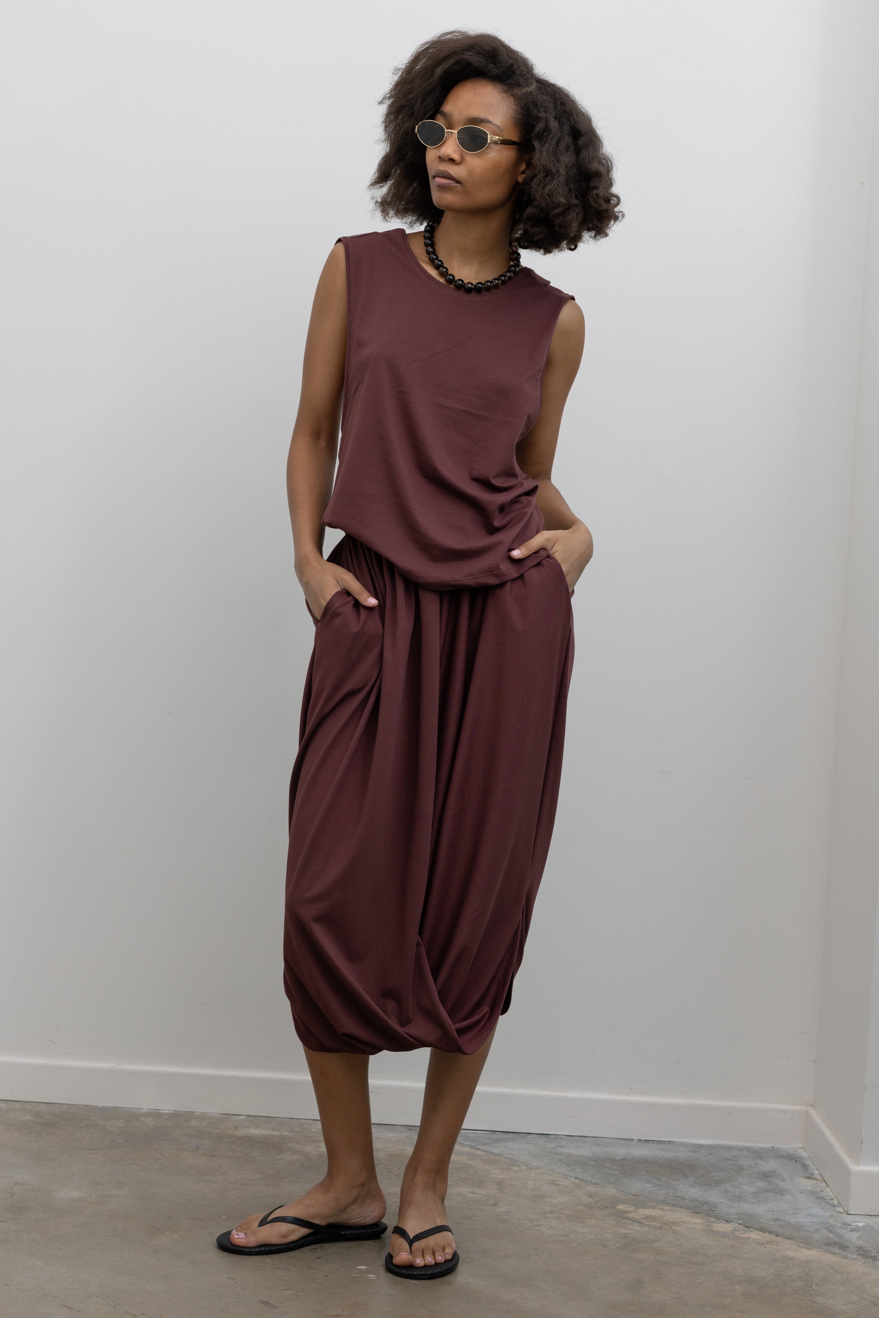 Collective cotton-blend cocoon midi skirt with draped hem and elastic waistband at Alas Eius