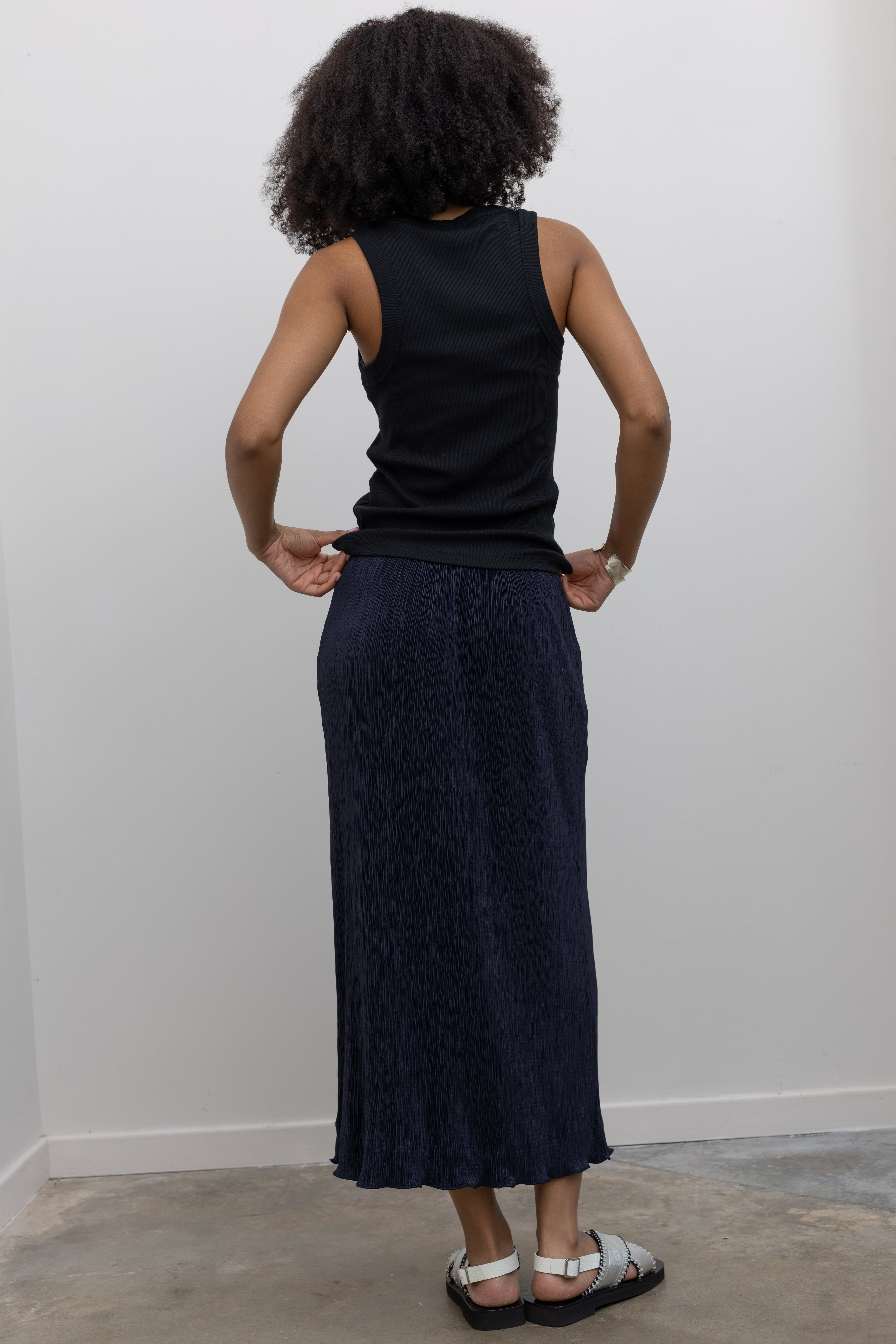 Collective dark navy pleated midi skirt with elastic waist at Alas Eius