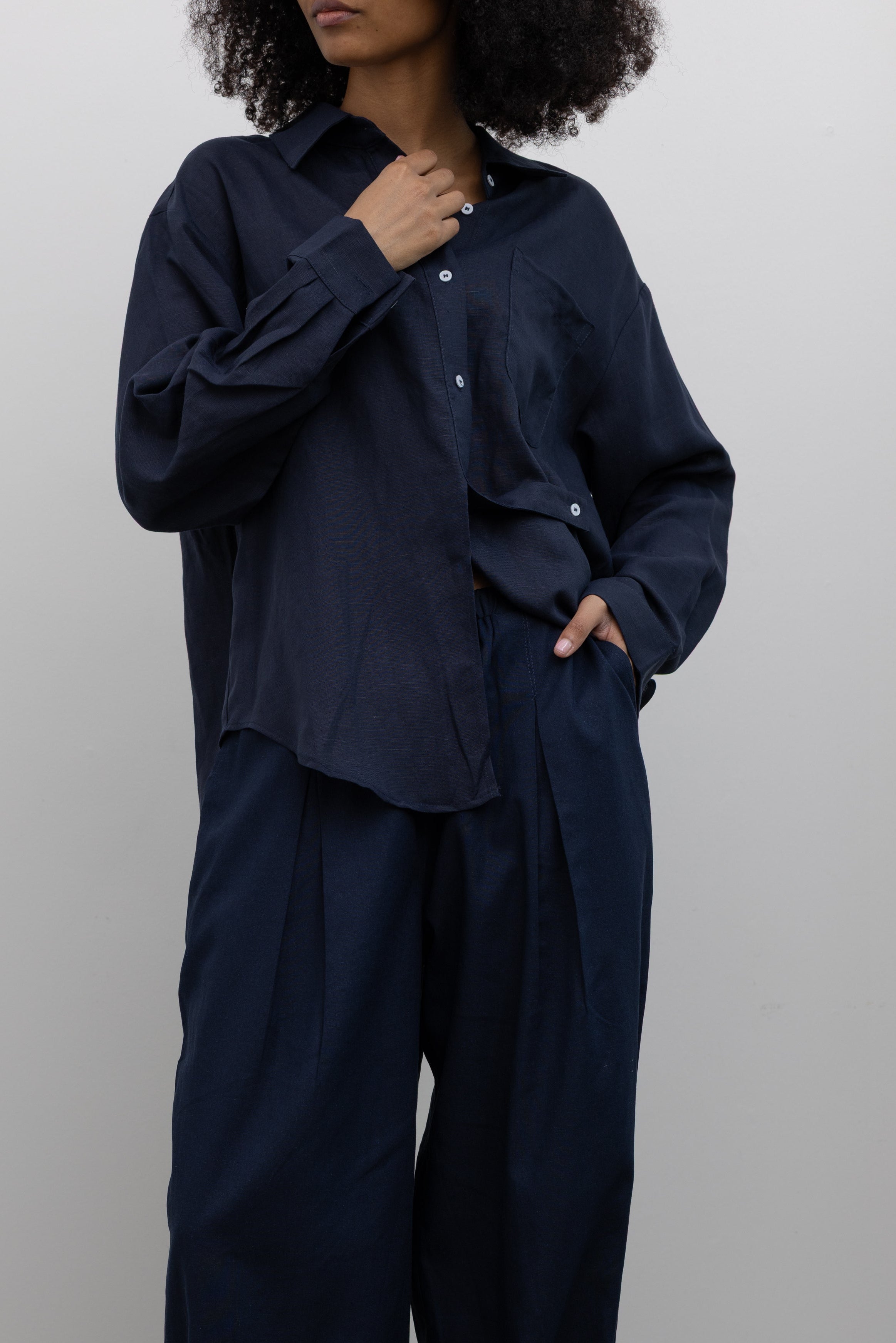 Collective Ink Linen Tuck Pants in breathable linen with elegant drape at Alas Eius